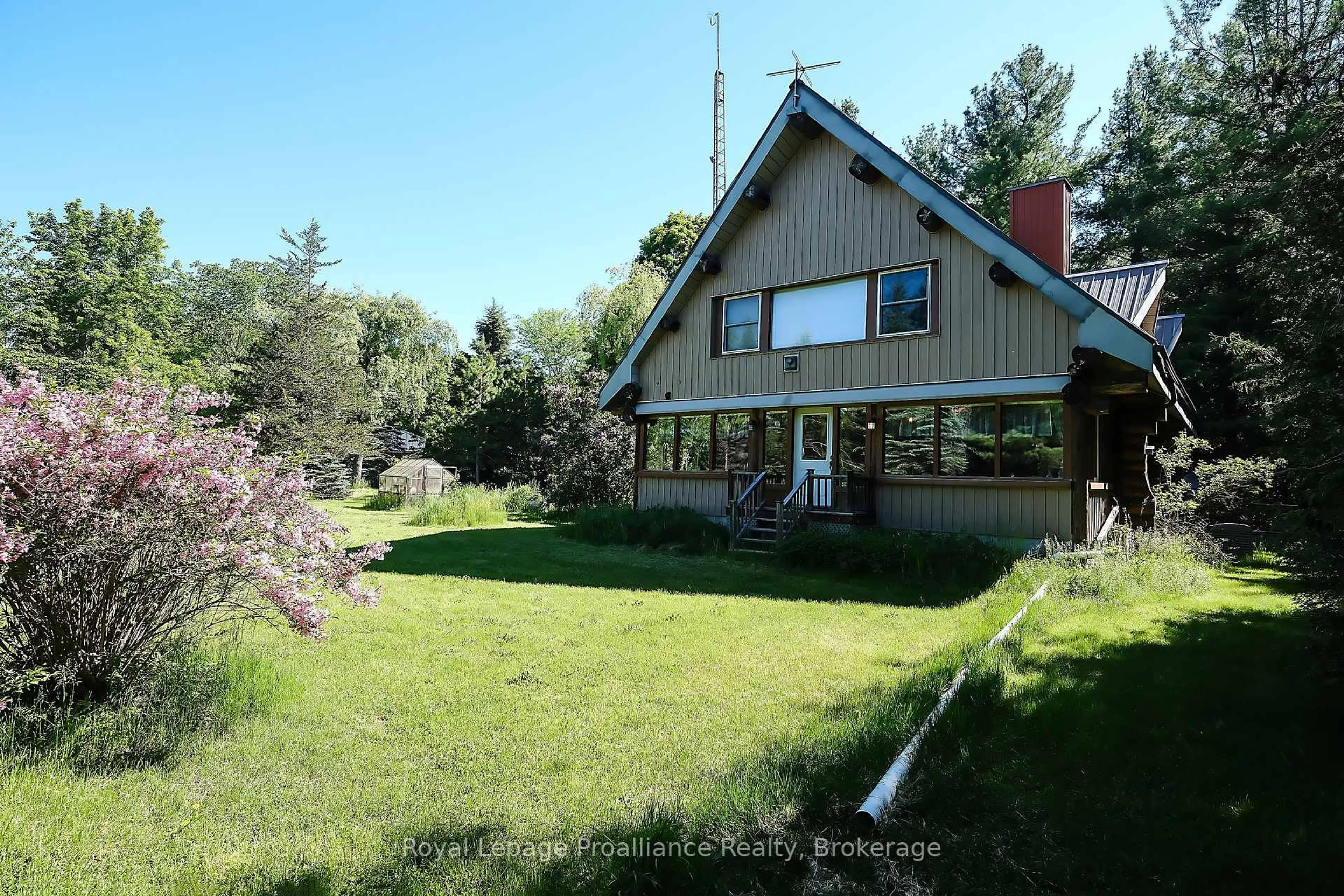 A pic from outside/outdoor area/front of a property/back of a property/a pic from drone, mountain view for 11 Crookston Rd, Madoc Ontario K0K 2K0