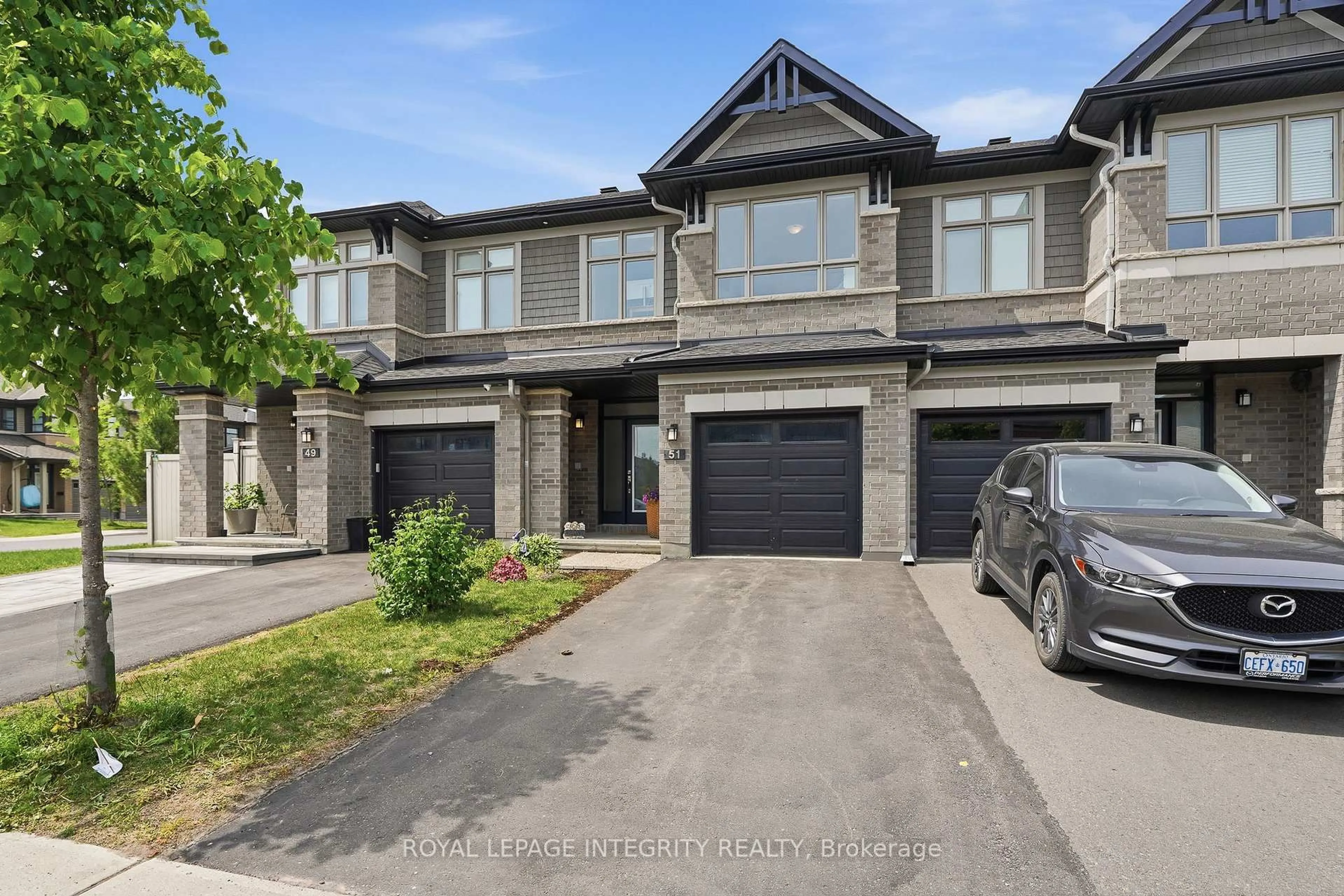 A pic from outside/outdoor area/front of a property/back of a property/a pic from drone, street for 51 Bergschrund Walk, Ottawa Ontario K1W 0P9