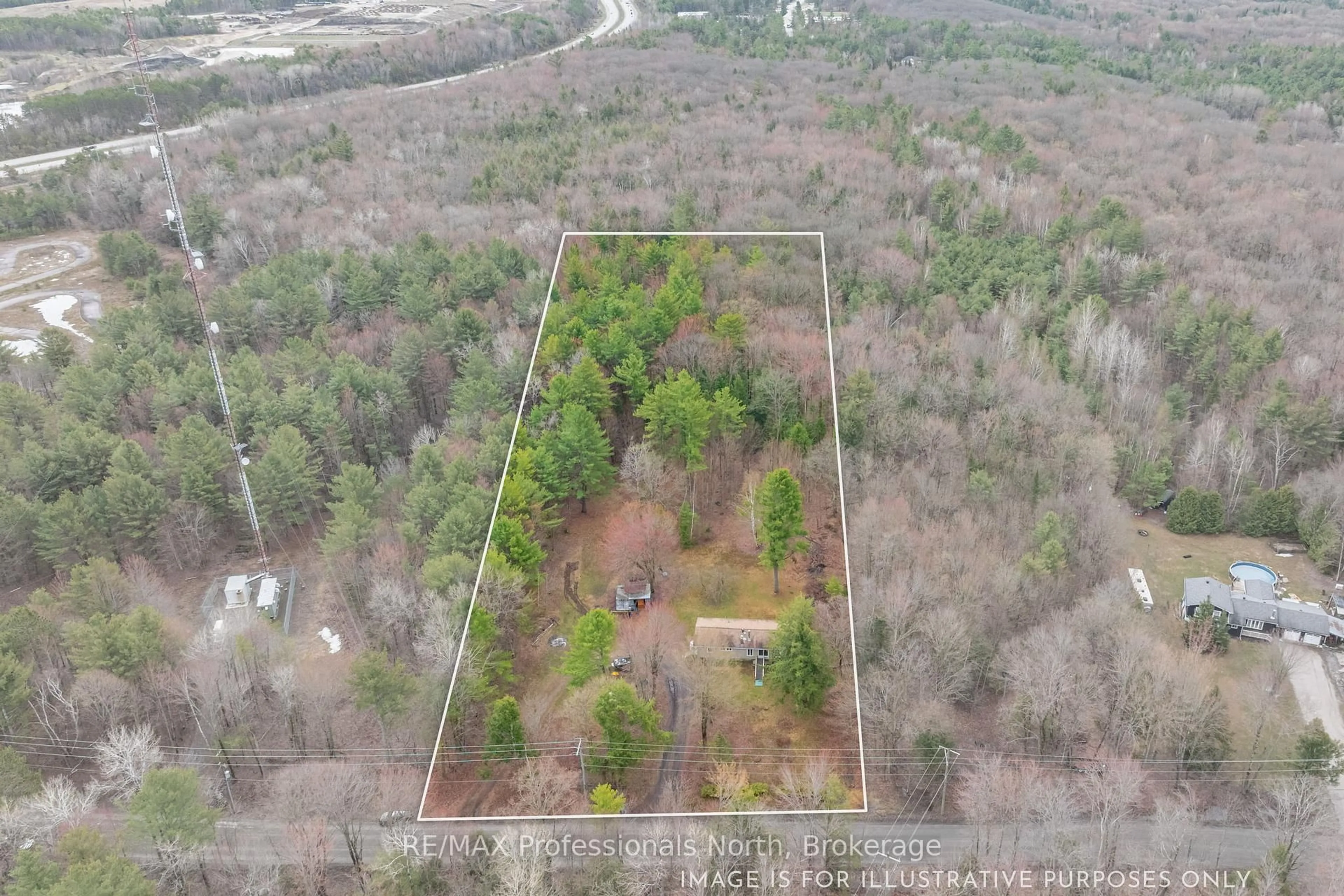 A pic from outside/outdoor area/front of a property/back of a property/a pic from drone, forest/trees view for 1056 Kirk Line, Bracebridge Ontario P1L 1W9