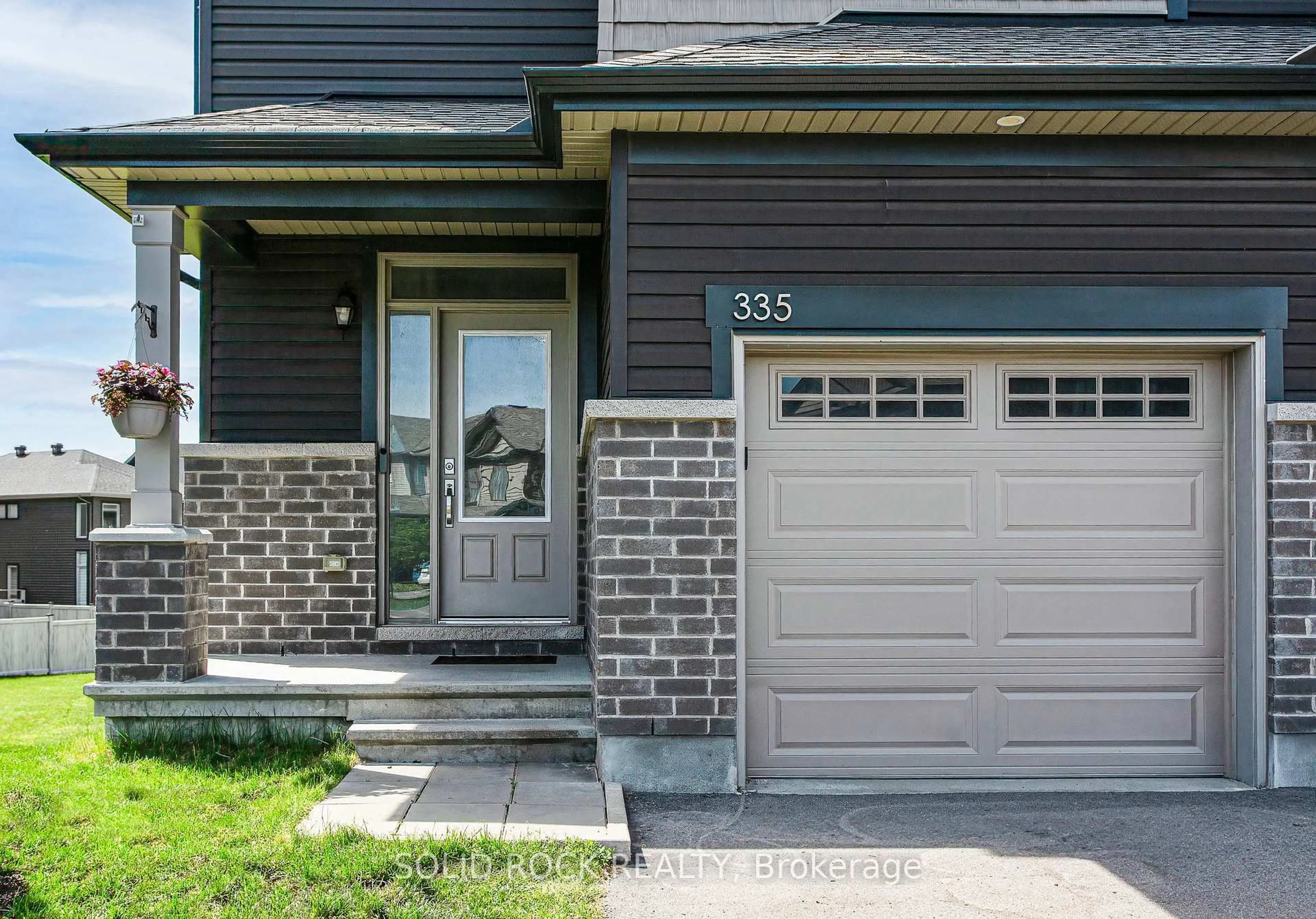 Home with brick exterior material, street for 335 Grackle St, Ottawa Ontario K1X 0G6