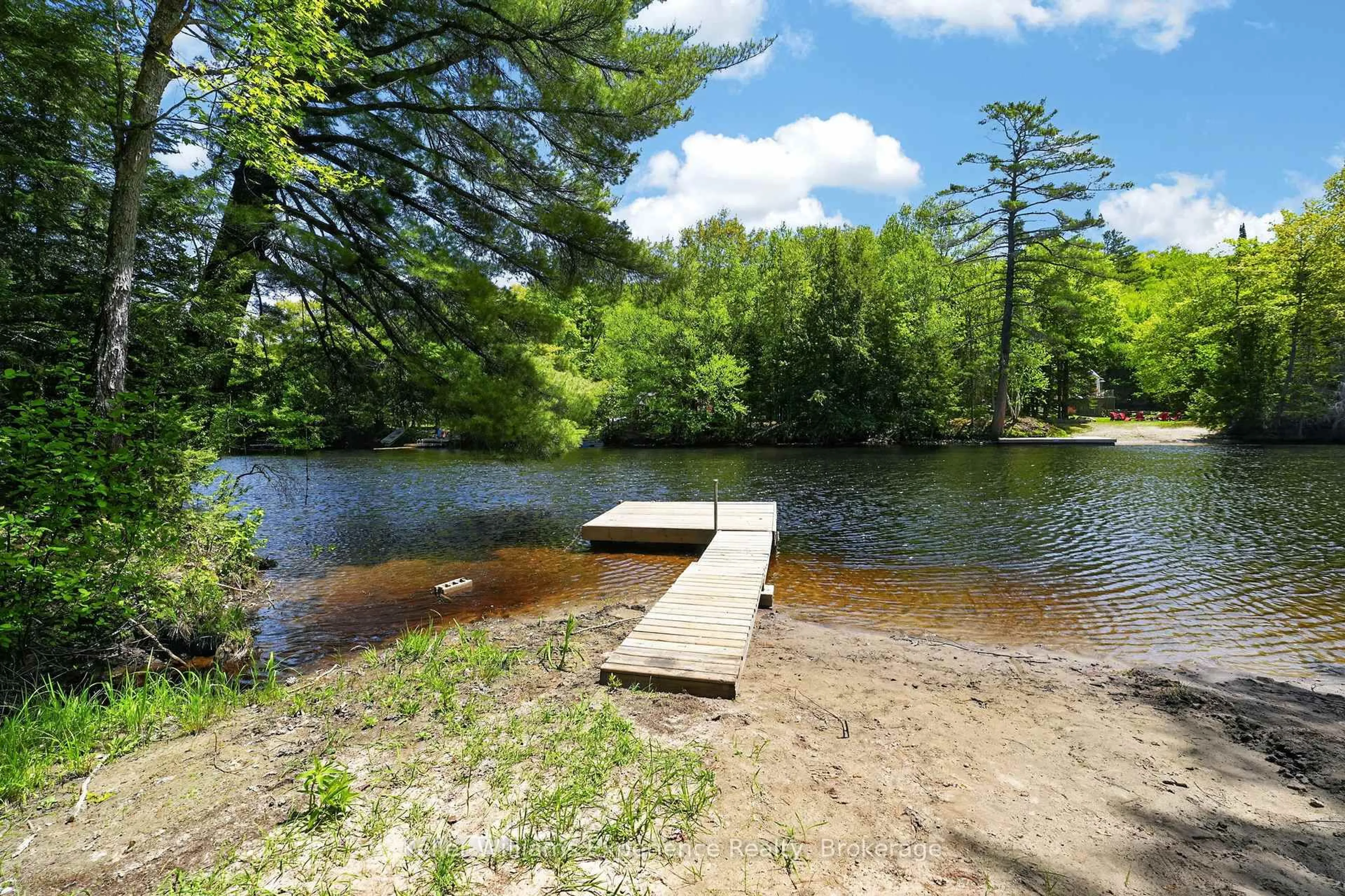 Patio, water/lake/river/ocean view for 1077 Holiday Park Dr, Bracebridge Ontario P1L 1W9