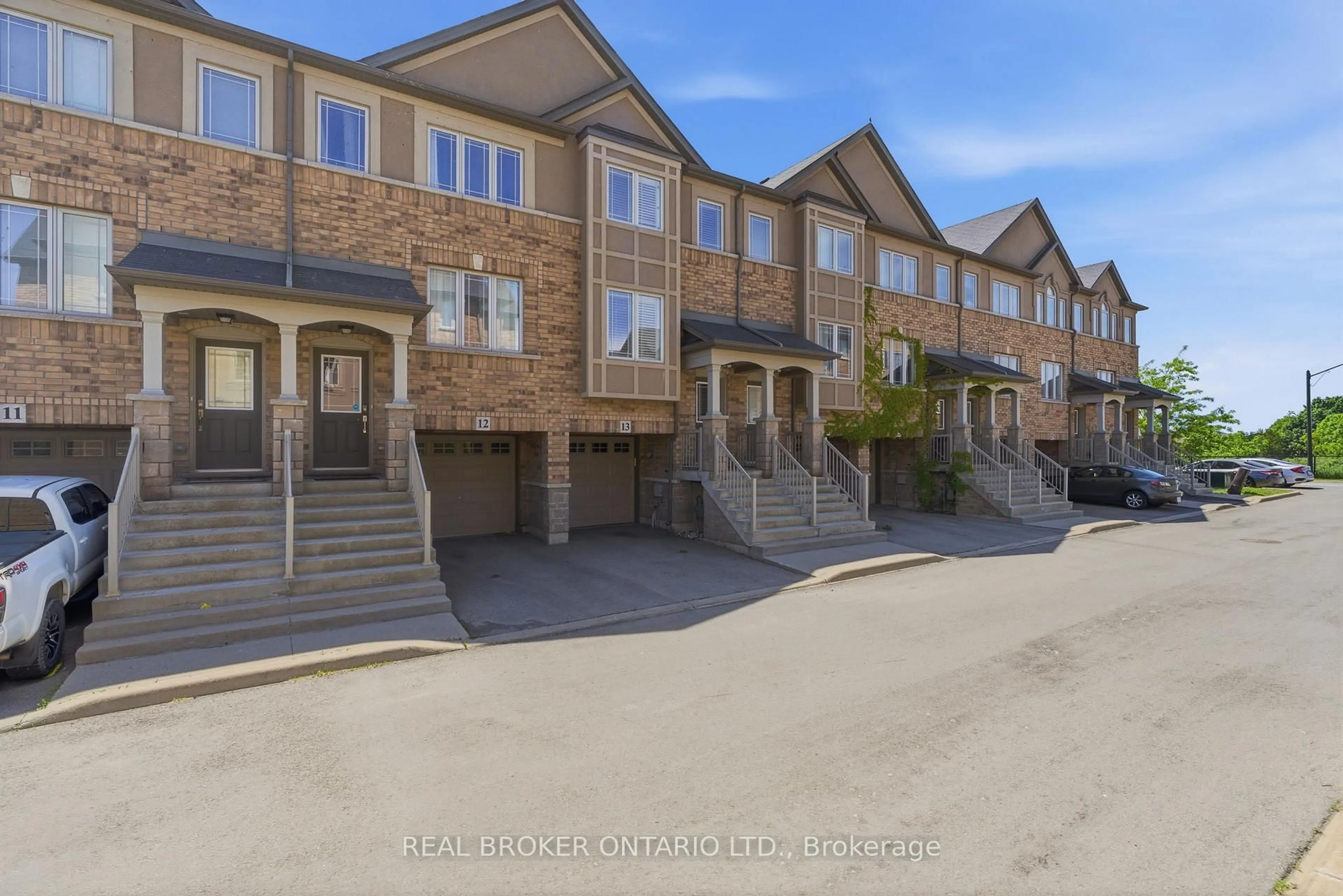 A pic from outside/outdoor area/front of a property/back of a property/a pic from drone, street for 201 Westbank Tr #13, Hamilton Ontario L8J 0H4