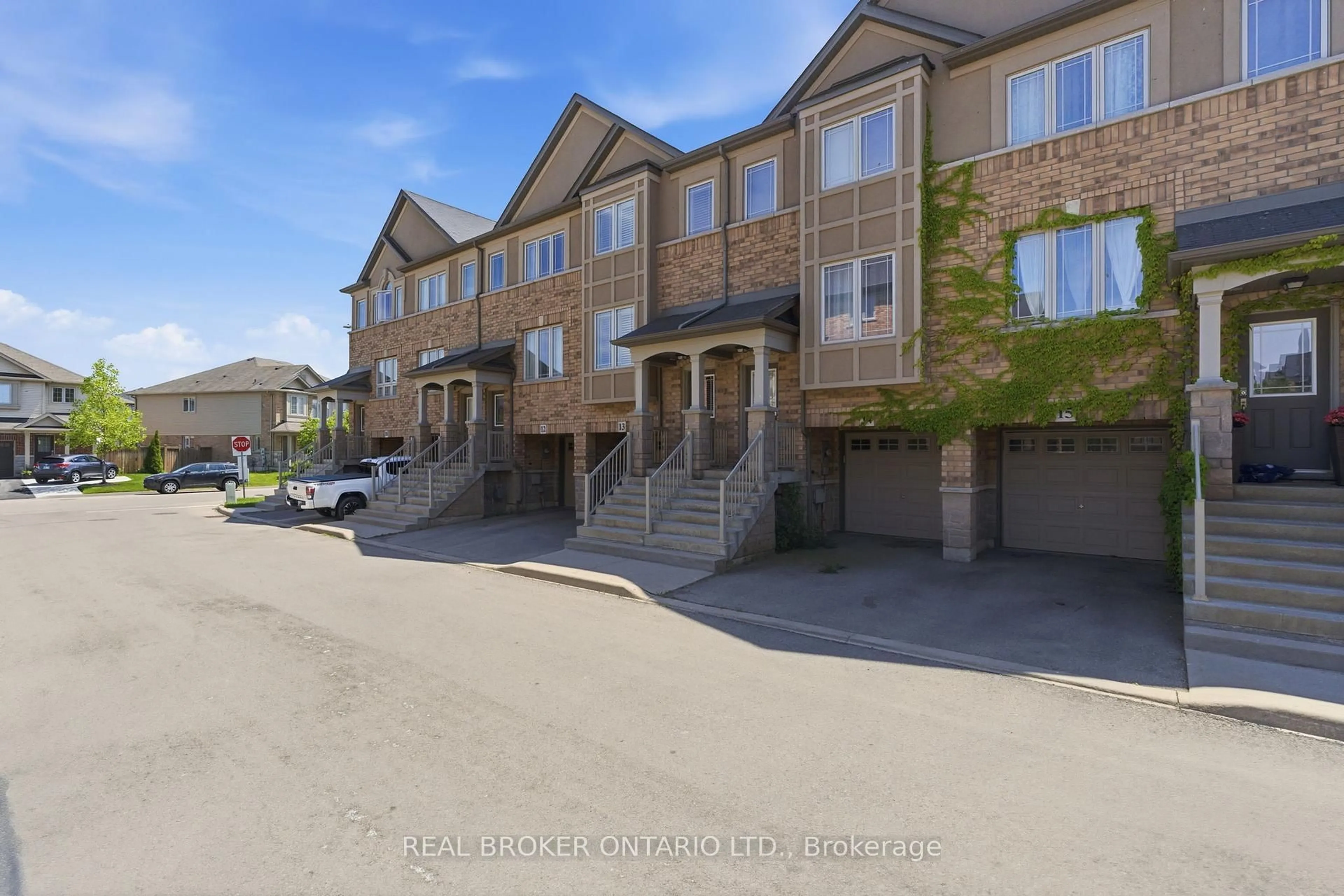 A pic from outside/outdoor area/front of a property/back of a property/a pic from drone, street for 201 Westbank Tr #13, Hamilton Ontario L8J 0H4