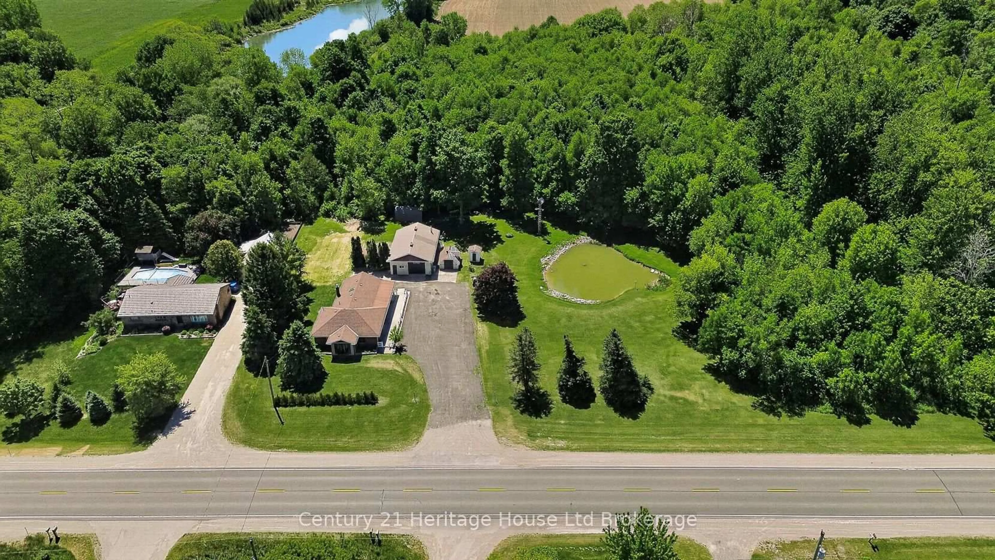 A pic from outside/outdoor area/front of a property/back of a property/a pic from drone, water/lake/river/ocean view for 15067 Elginfield Rd, Lucan Biddulph Ontario N0M 1V0