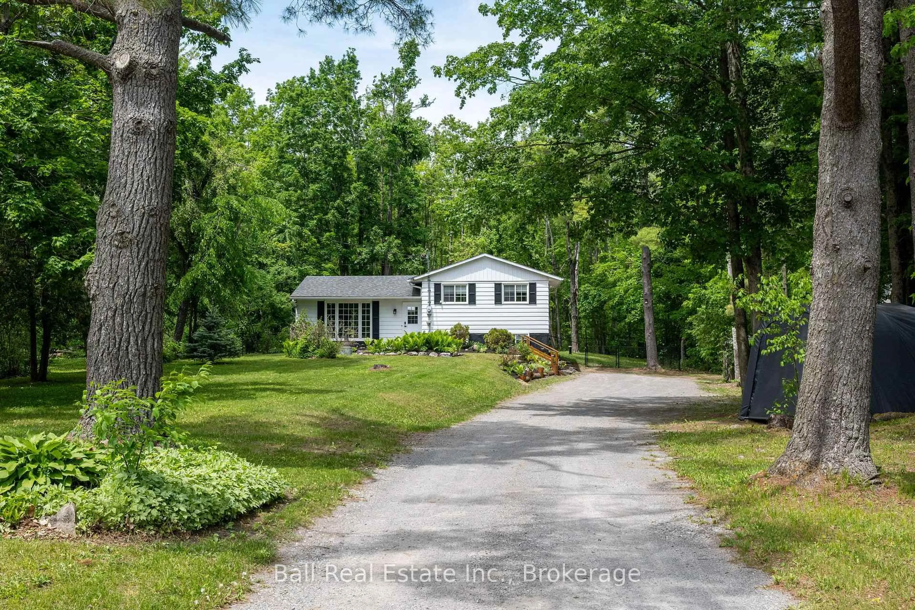 A pic from outside/outdoor area/front of a property/back of a property/a pic from drone, street for 1741 Lakehurst Rd, Trent Lakes Ontario K0L 2H0
