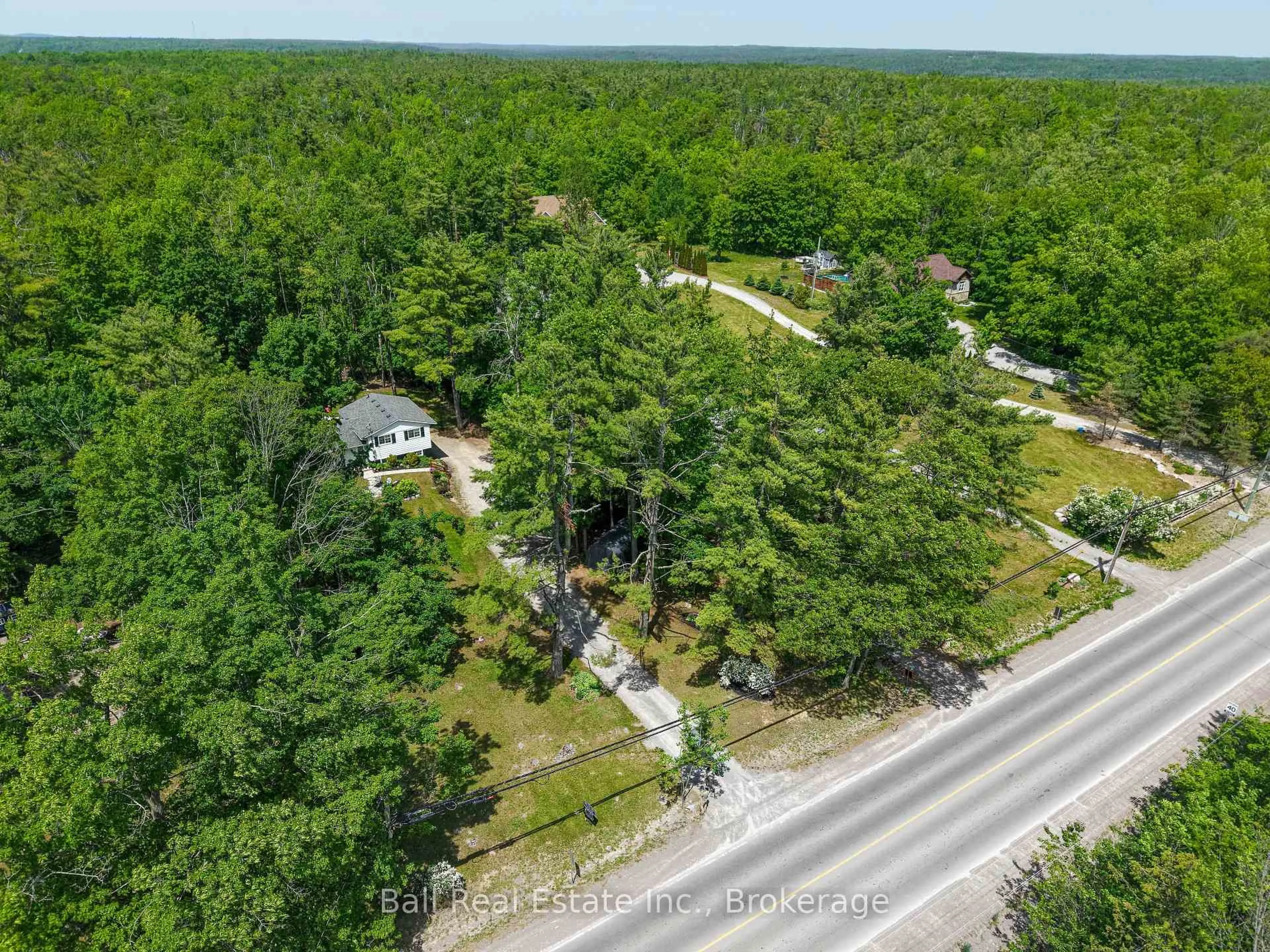 A pic from outside/outdoor area/front of a property/back of a property/a pic from drone, forest/trees view for 1741 Lakehurst Rd, Trent Lakes Ontario K0L 2H0