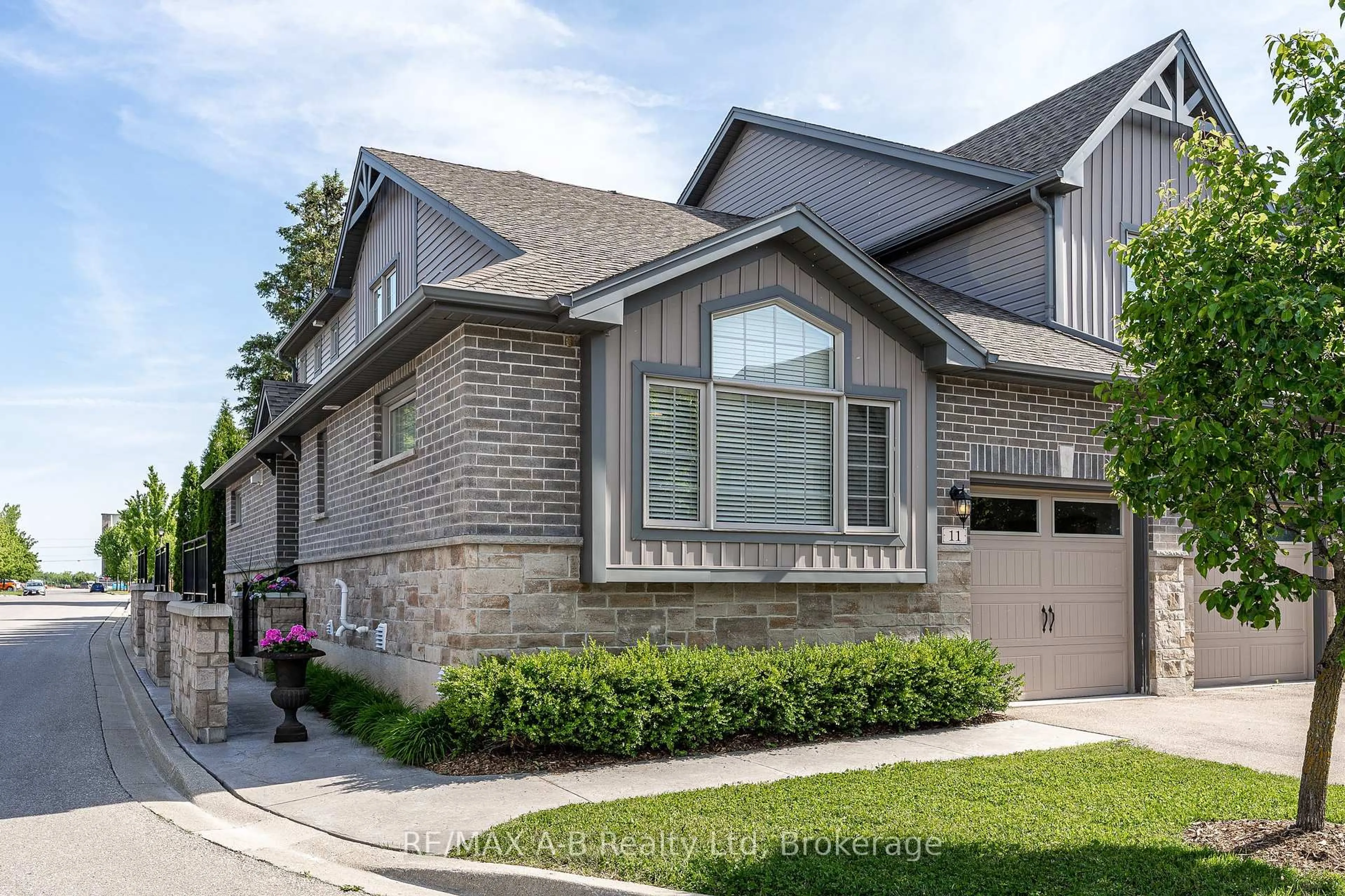 Home with brick exterior material, street for 55 Harrison St #11, Stratford Ontario N5A 0C9