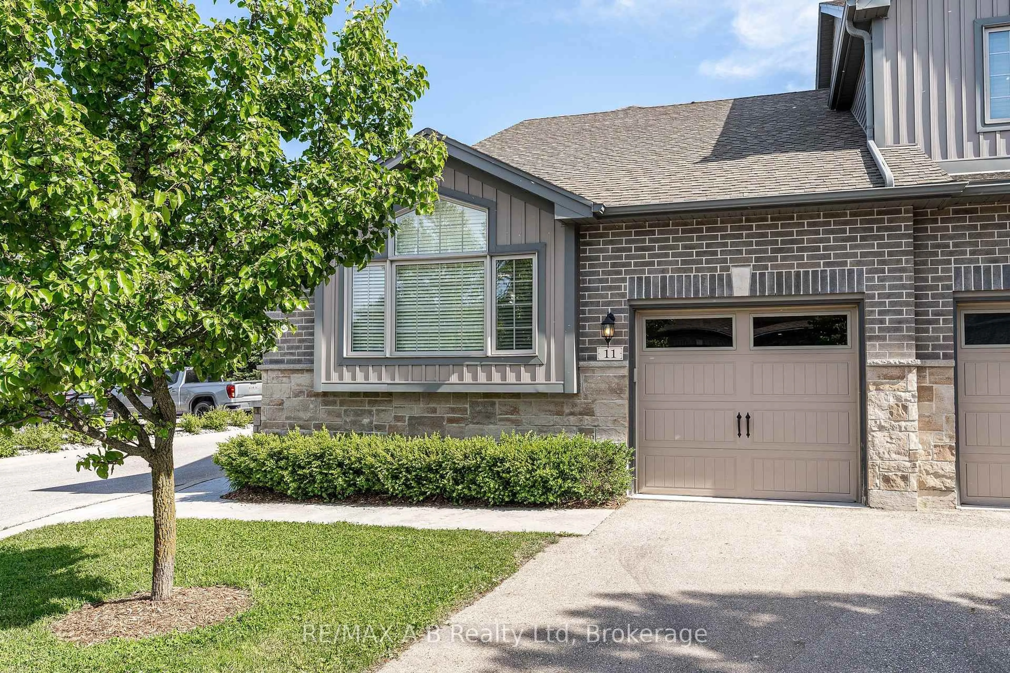 Home with brick exterior material, street for 55 Harrison St #11, Stratford Ontario N5A 0C9