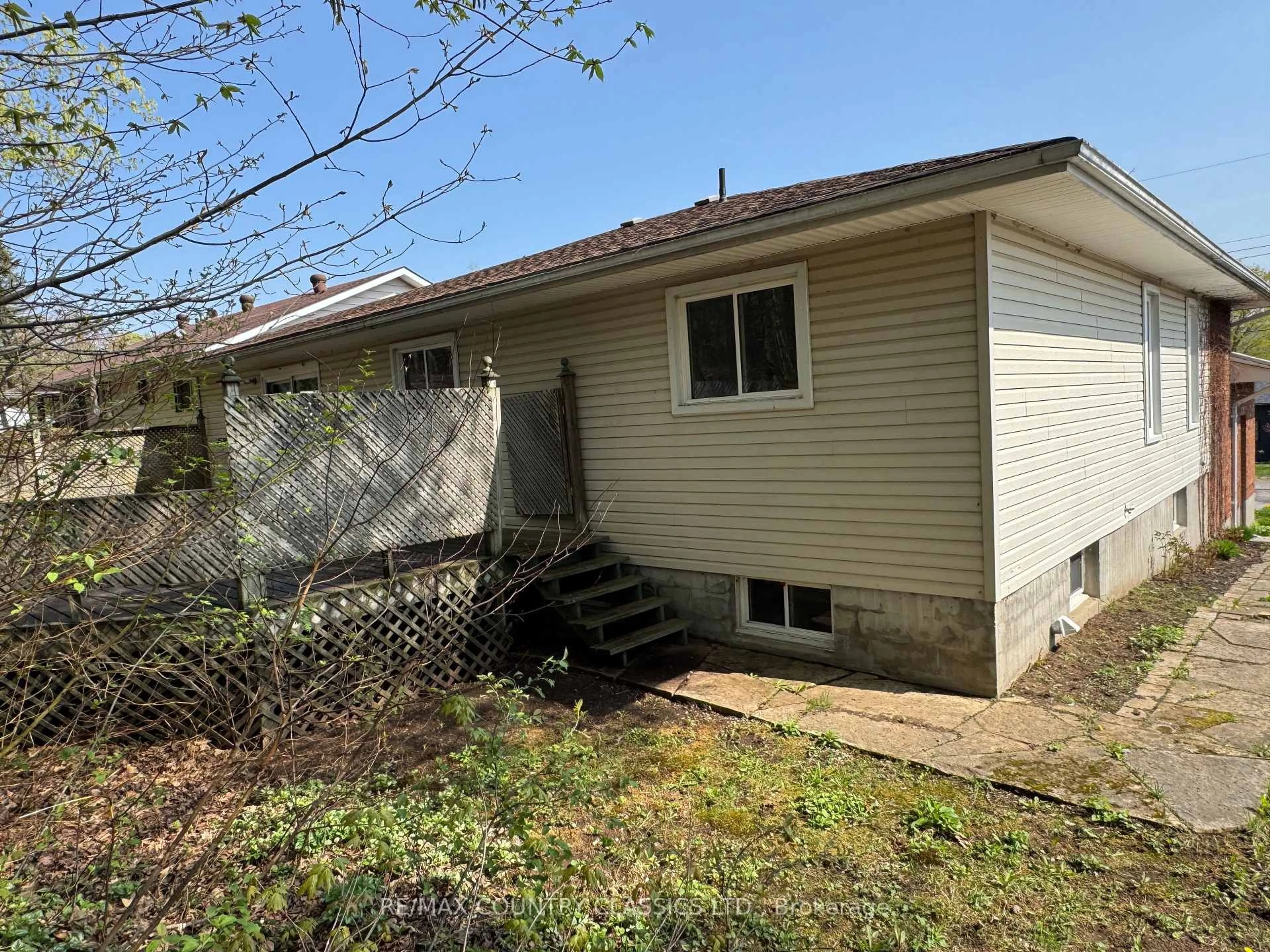 Home with vinyl exterior material, street for 16 Maple St, Bancroft Ontario K0L 1C0