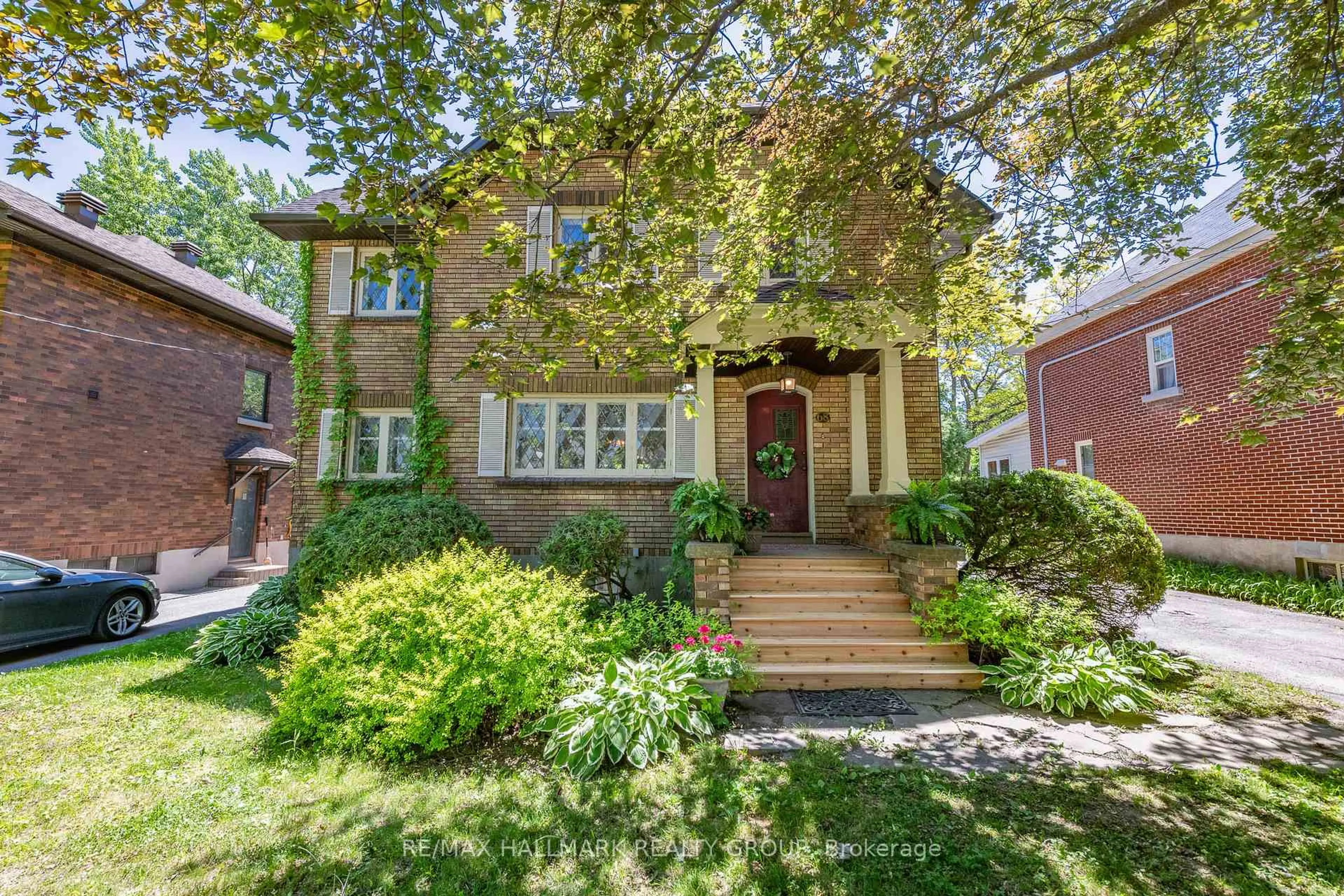 Home with brick exterior material, street for 68 Kenora St, Ottawa Ontario K1Y 3L1