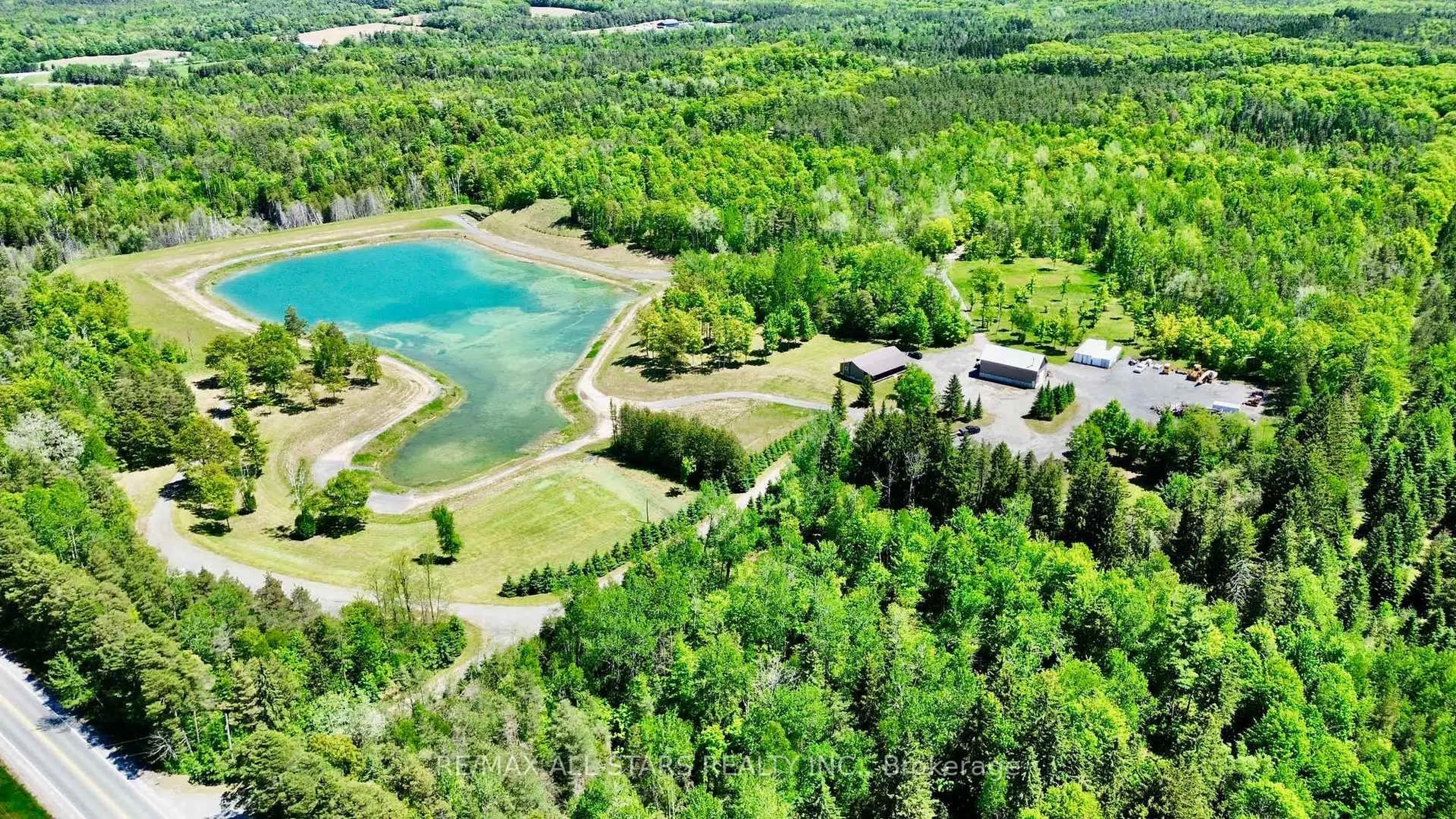 A pic from outside/outdoor area/front of a property/back of a property/a pic from drone, water/lake/river/ocean view for 502 PontyPool Rd, Kawartha Lakes Ontario L0A 1K0