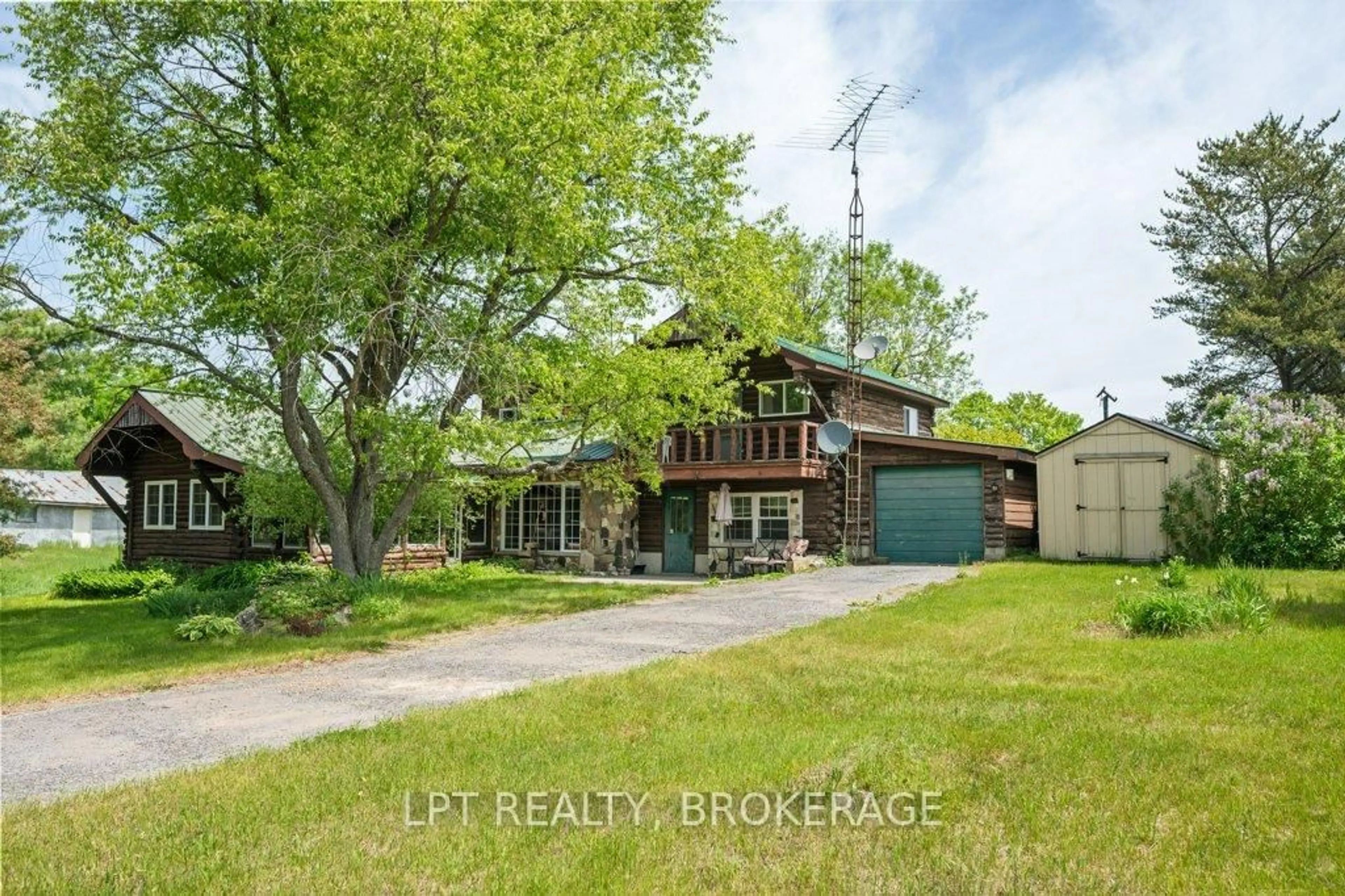A pic from outside/outdoor area/front of a property/back of a property/a pic from drone, street for 4342 Henderson Rd, Arden Ontario K0H 1B0