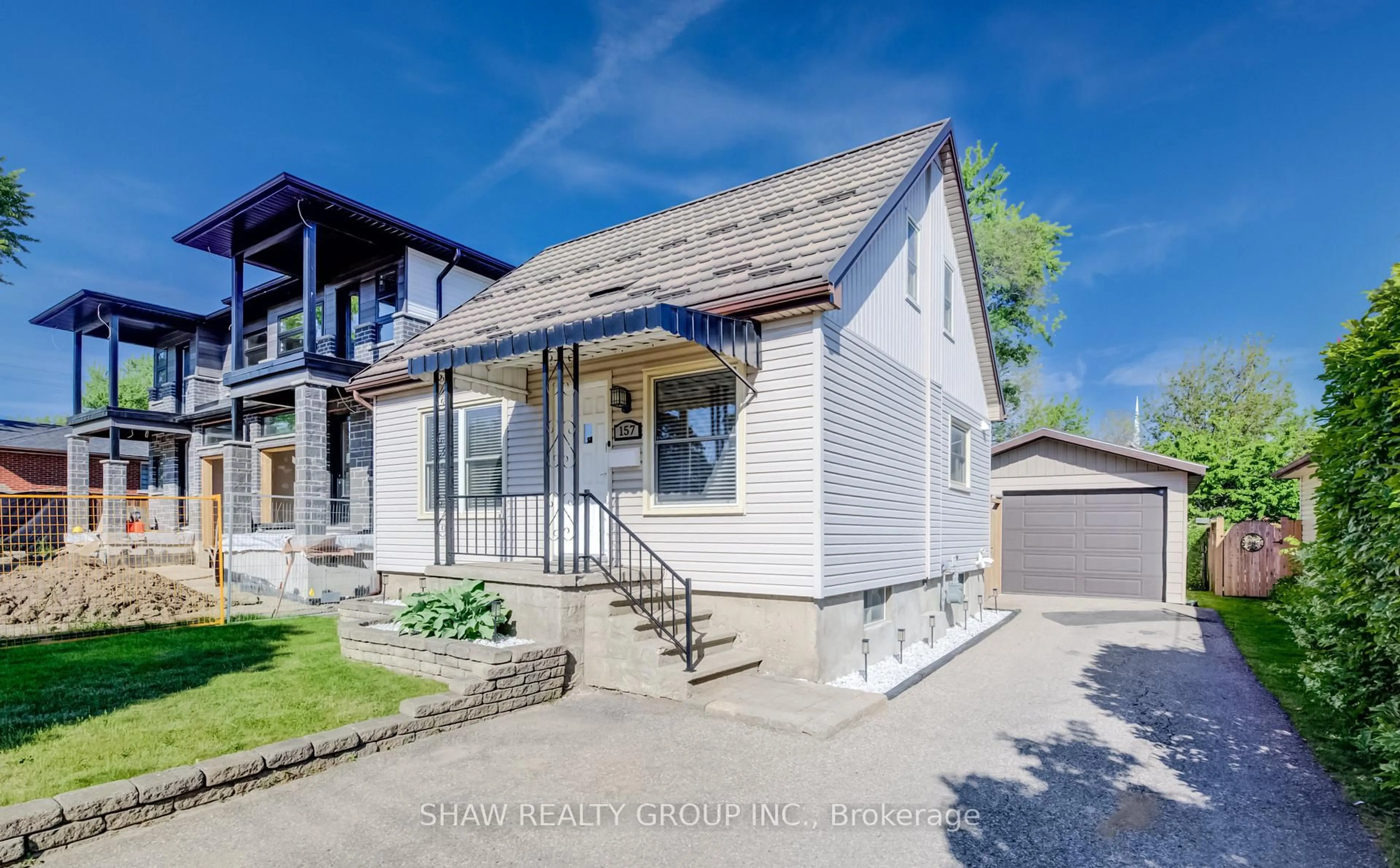 Home with brick exterior material, street for 157 Fifth Ave, Kitchener Ontario N2C 1P6