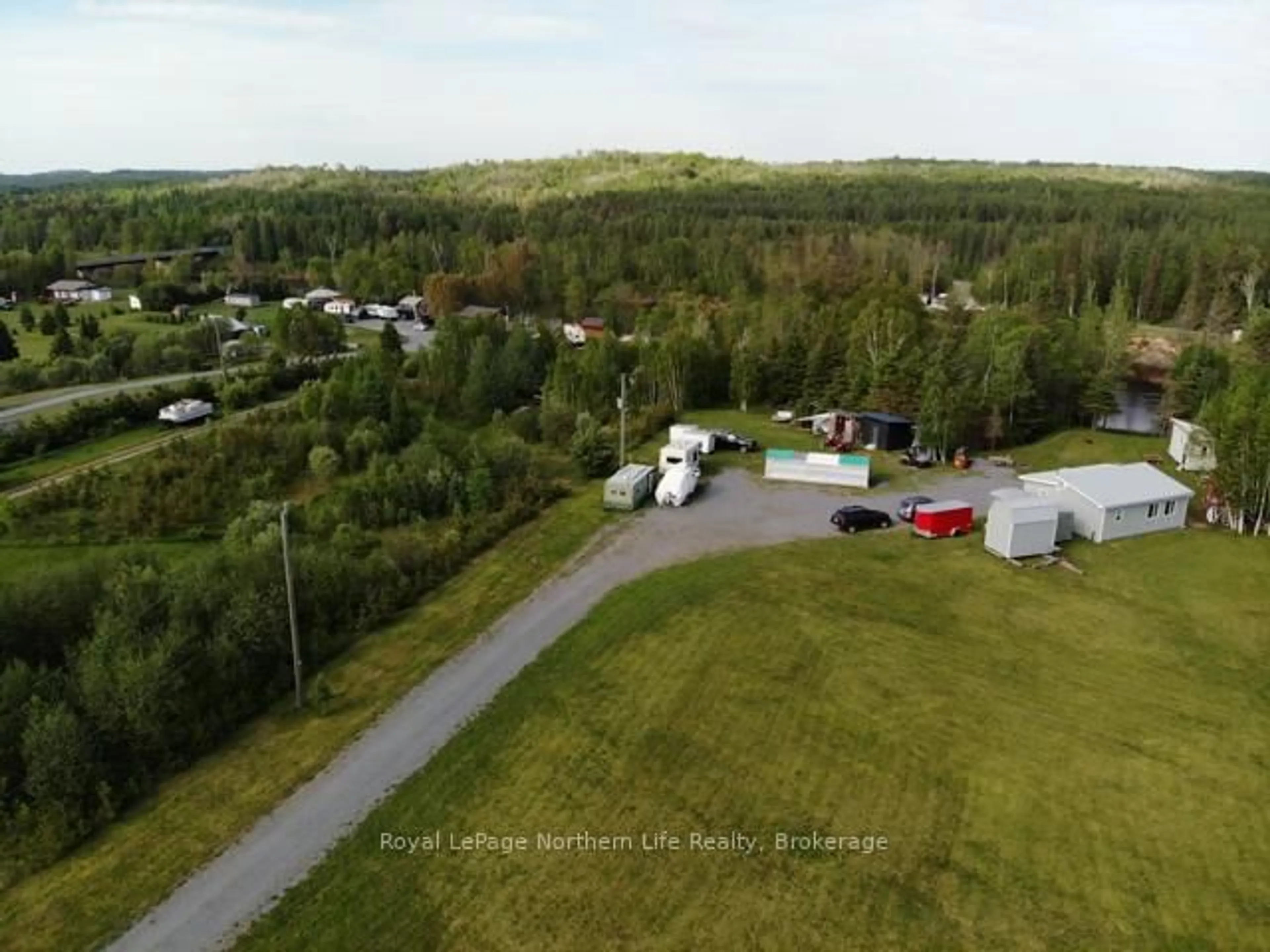 A pic from outside/outdoor area/front of a property/back of a property/a pic from drone, unknown for 49 Nicholson Rd, West Nipissing Ontario P0H 2C0