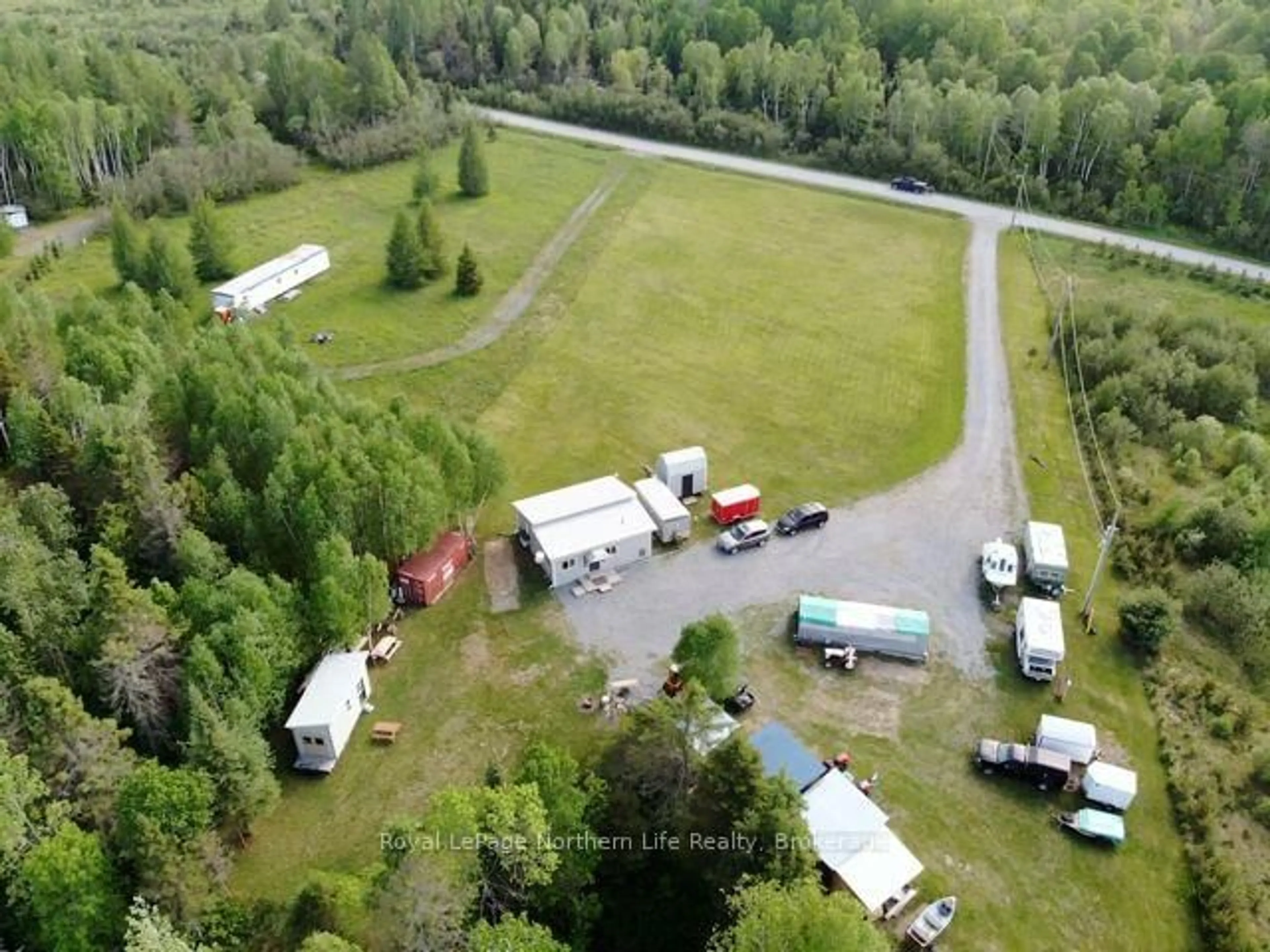 A pic from outside/outdoor area/front of a property/back of a property/a pic from drone, unknown for 49 Nicholson Rd, West Nipissing Ontario P0H 2C0
