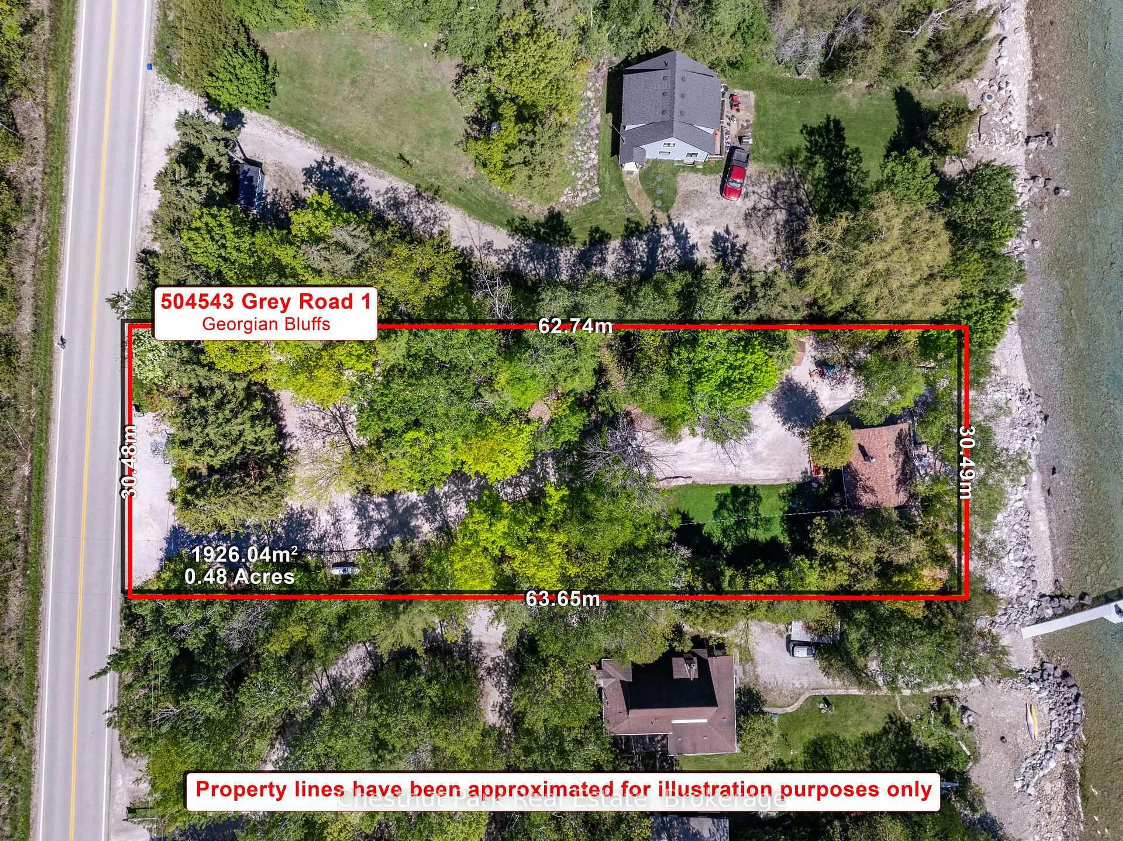 A pic from outside/outdoor area/front of a property/back of a property/a pic from drone, street for 504543 Grey Road 1, Georgian Bluffs Ontario N0H 2T0