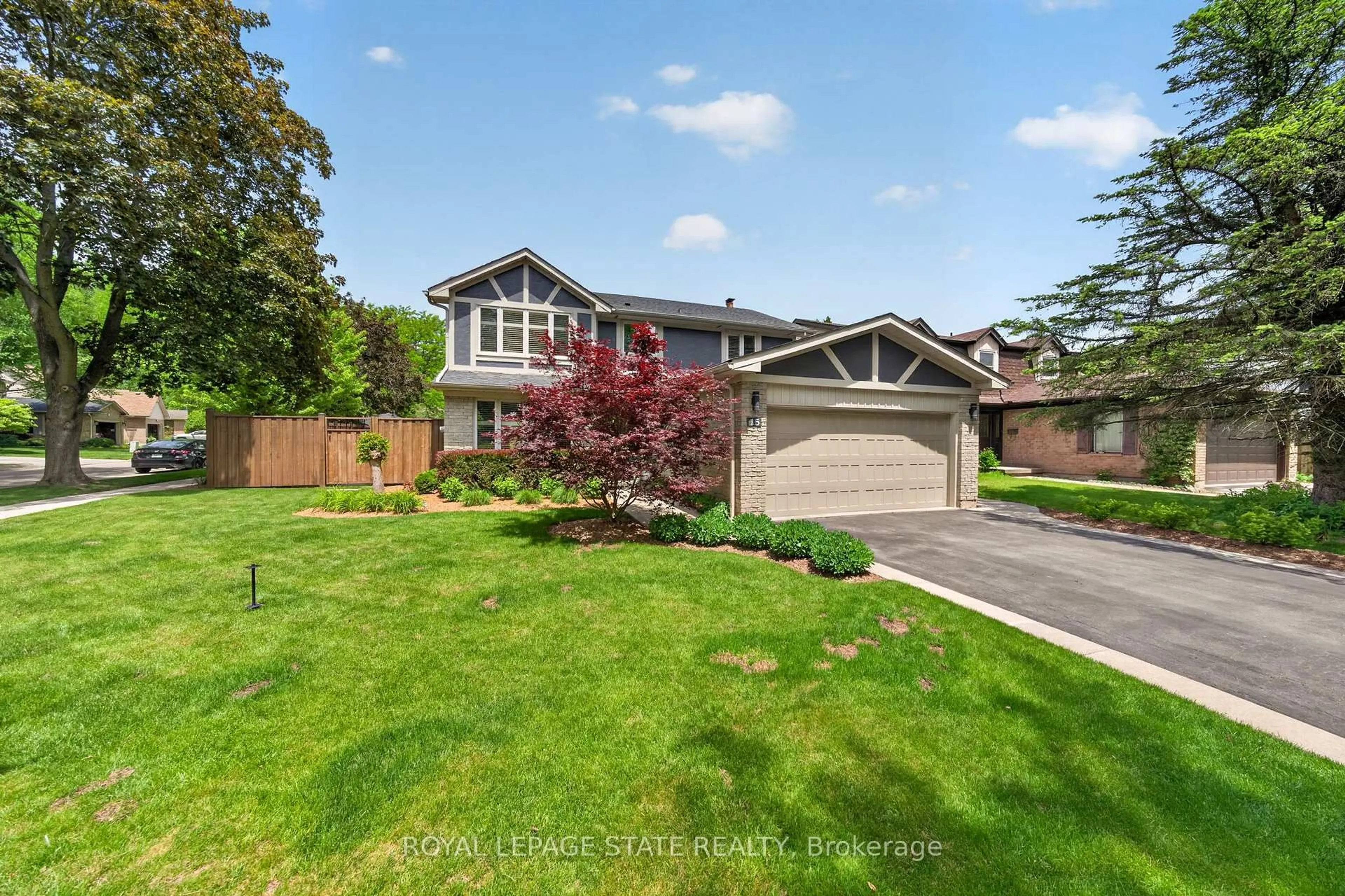 Home with brick exterior material, street for 15 Ravine Dr, Hamilton Ontario L9H 6K8