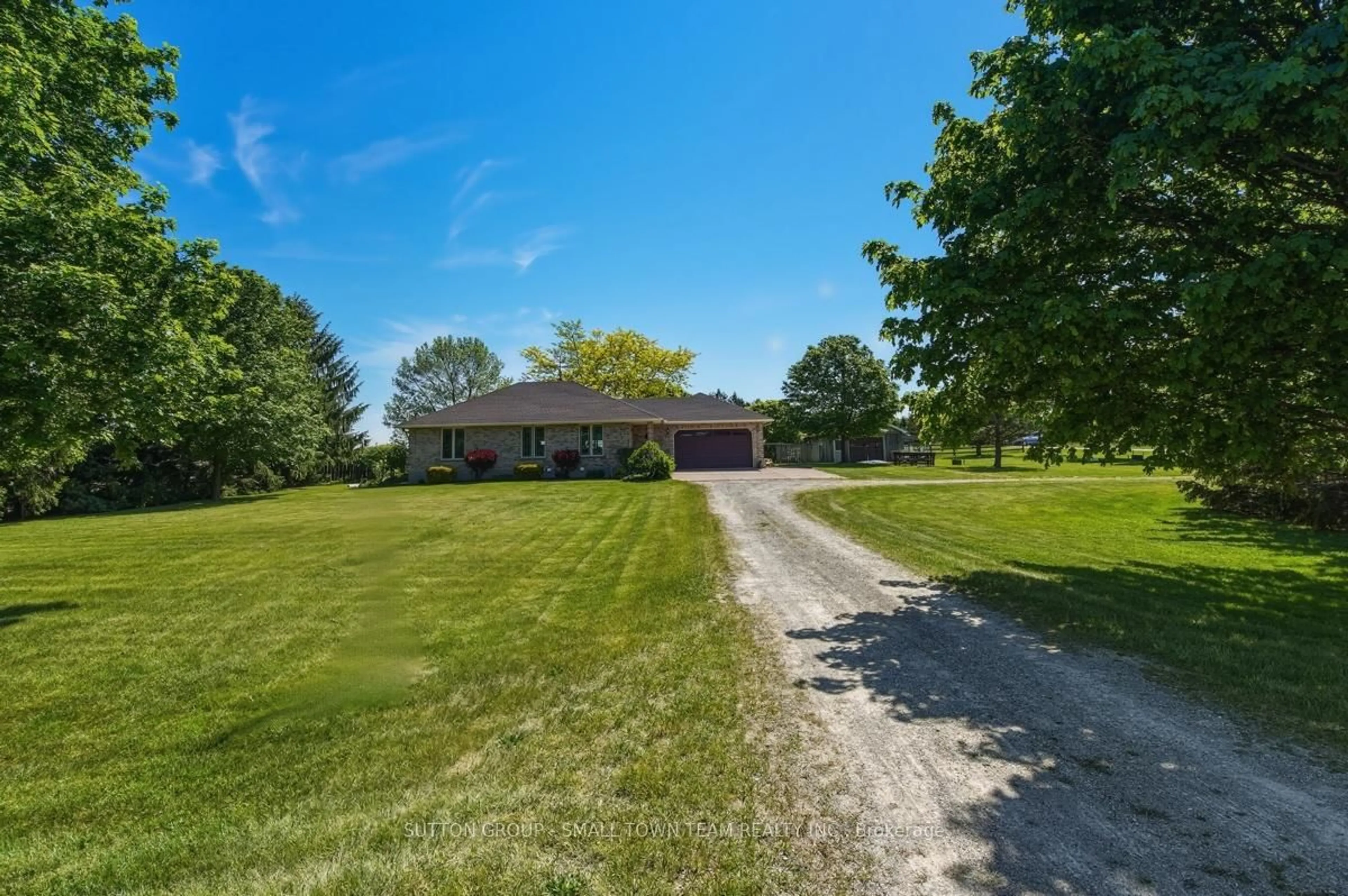 A pic from outside/outdoor area/front of a property/back of a property/a pic from drone, water/lake/river/ocean view for 69612 Bronson Line, South Huron Ontario N0M 1N0