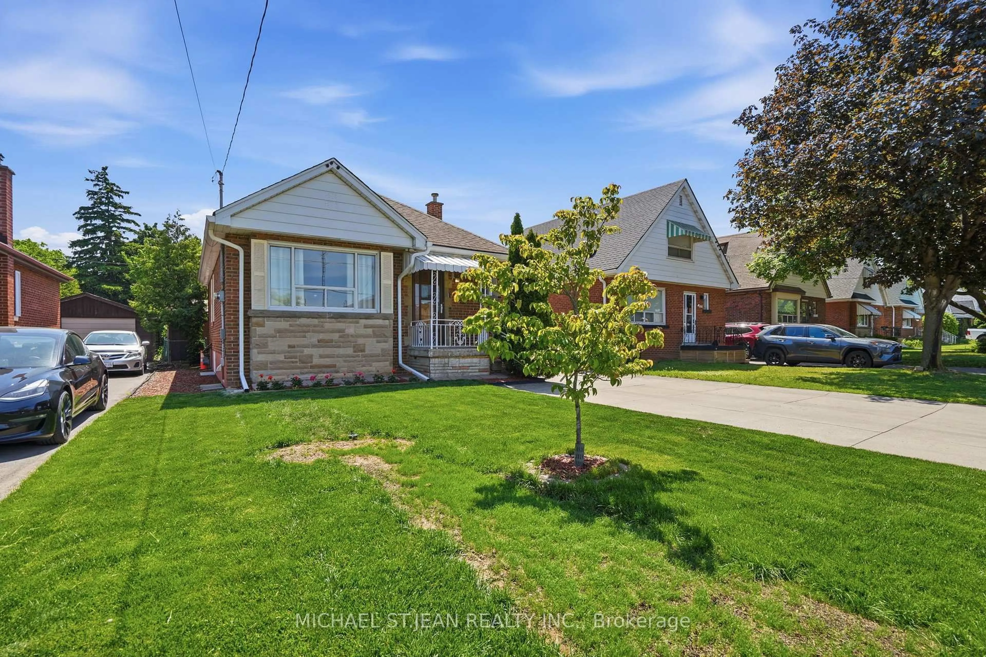 Home with brick exterior material, street for 133 Beland Ave, Hamilton Ontario L8K 3T5