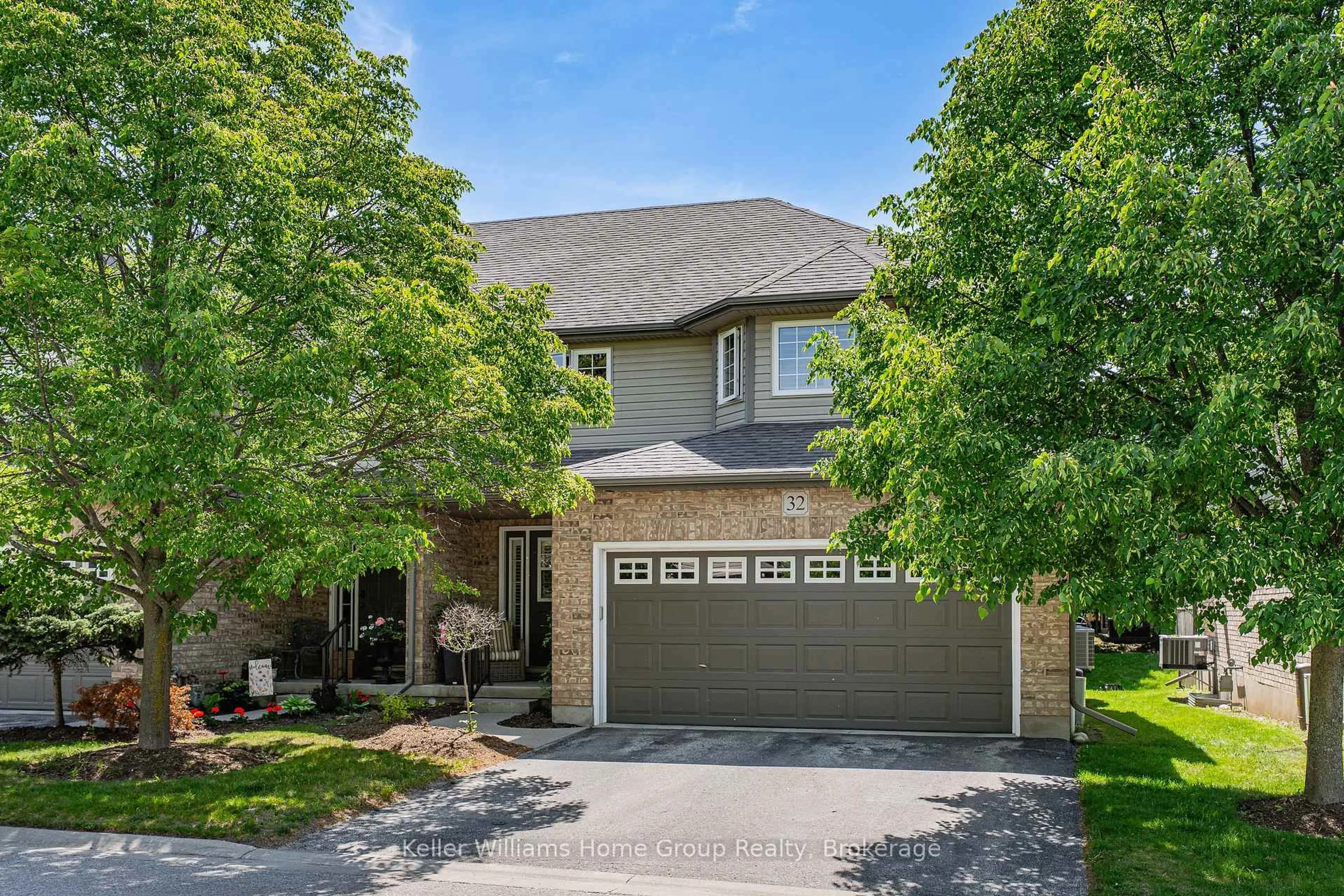 Home with brick exterior material, street for 255 Summerfield Dr #32, Guelph Ontario N1L 0E1
