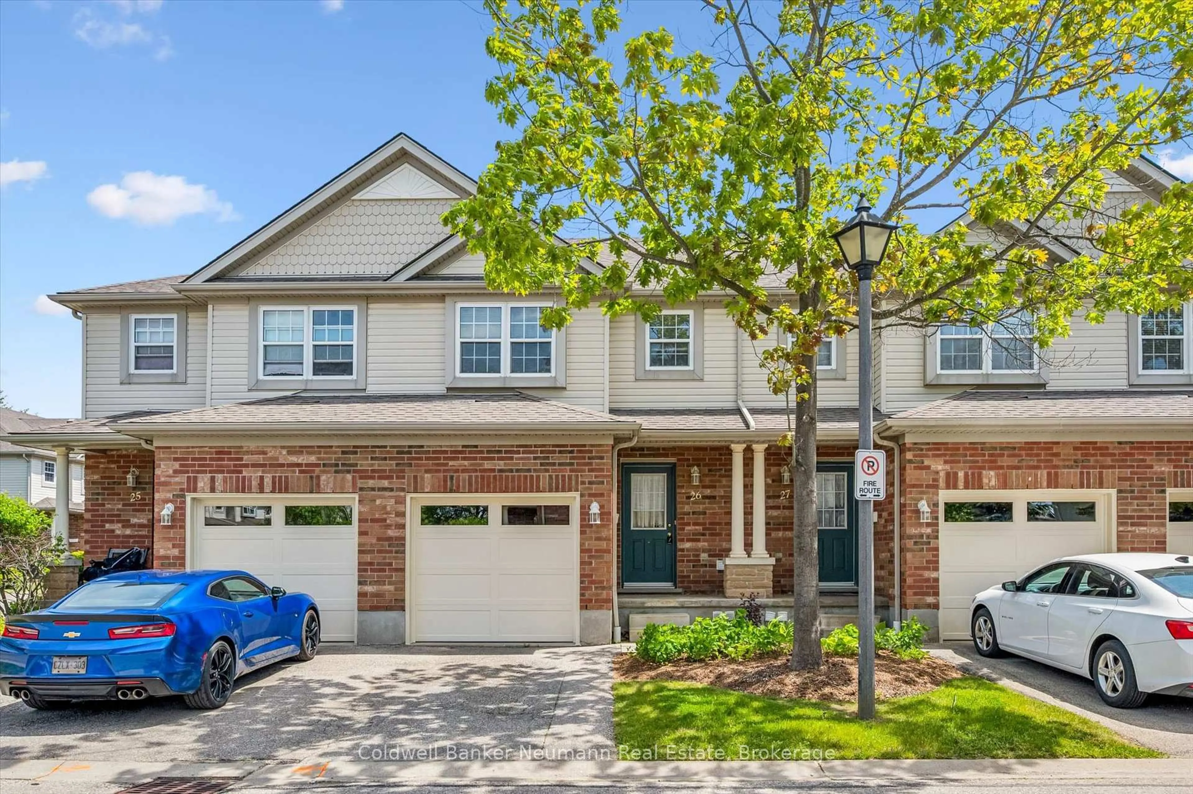 Home with brick exterior material, street for 30 Imperial Rd #26, Guelph Ontario N1K 1Y1