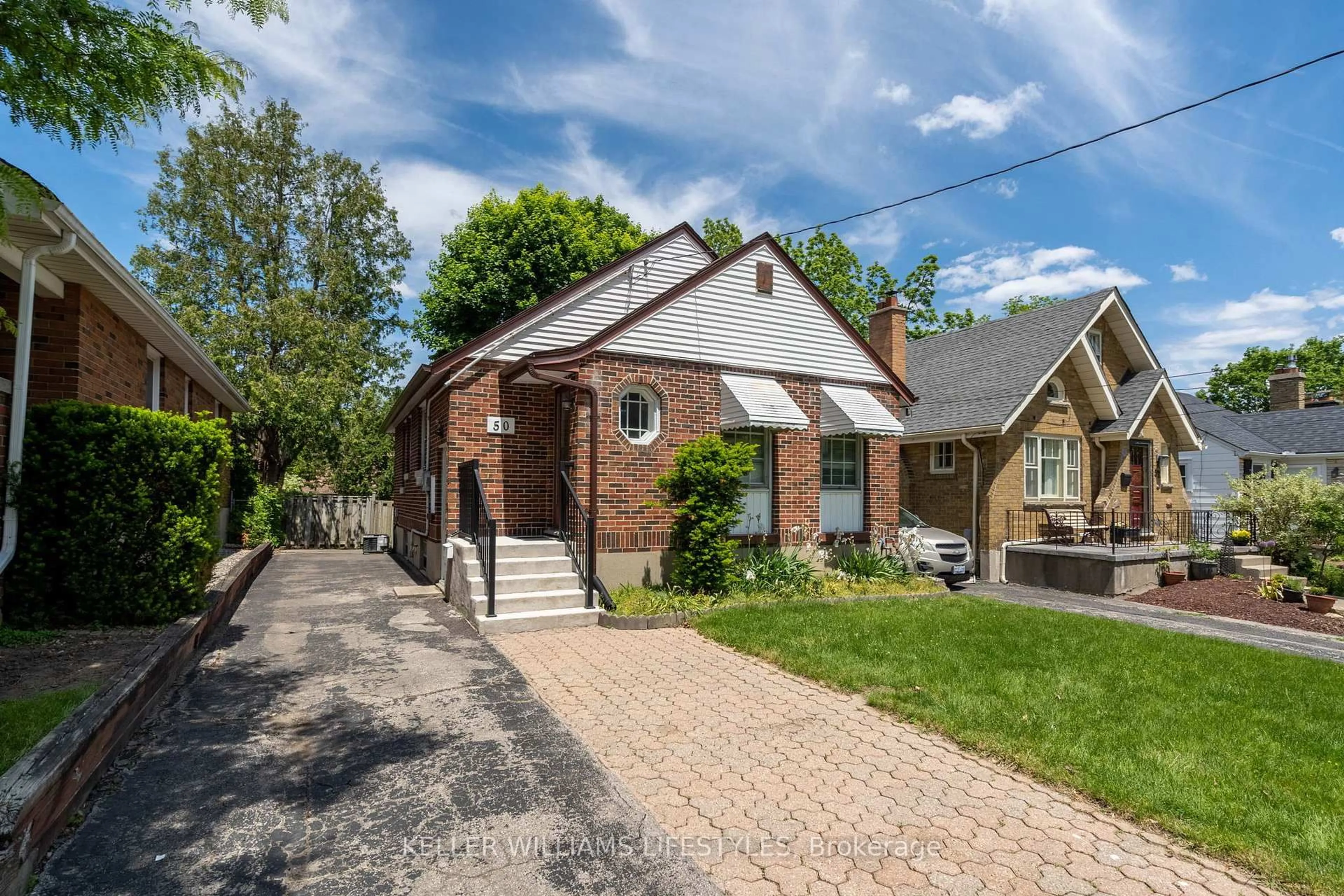Home with brick exterior material, street for 50 Thomas Janes Dr, London South Ontario N6C 2G9