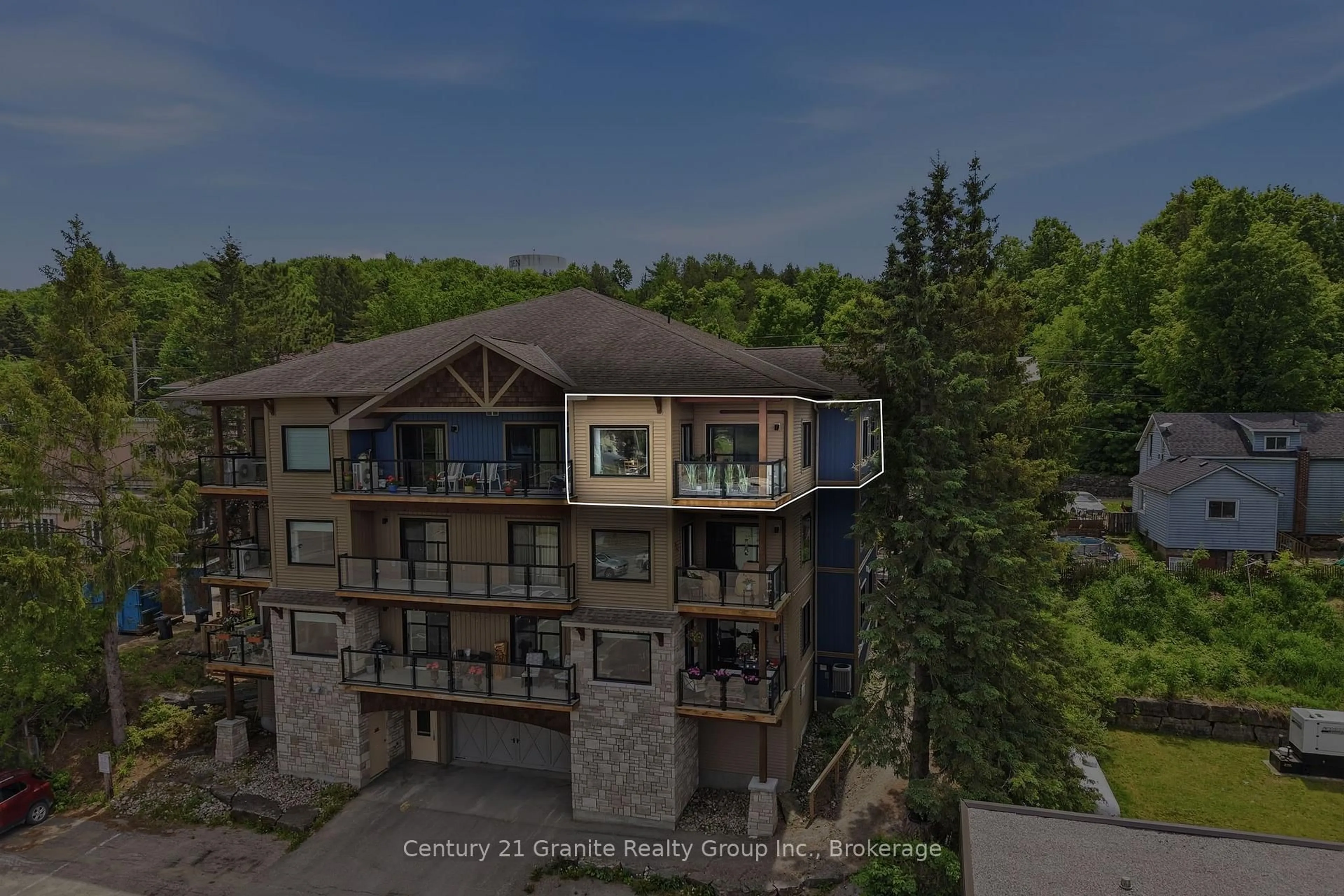 A pic from outside/outdoor area/front of a property/back of a property/a pic from drone, building for 9 Newcastle St #303, Minden Hills Ontario K0M 2K0