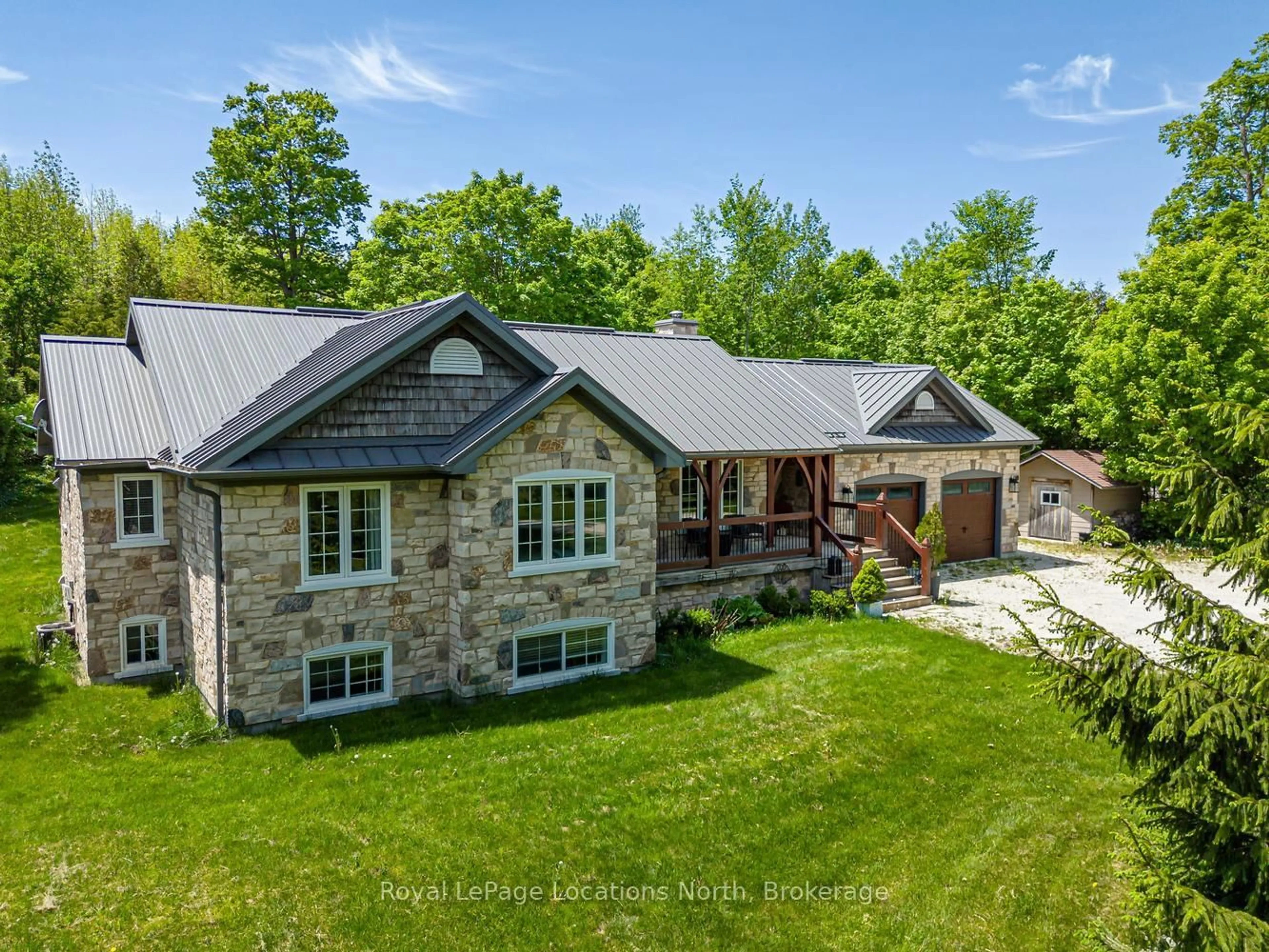 A pic from outside/outdoor area/front of a property/back of a property/a pic from drone, unknown for 104 INGLIS Dr, Grey Highlands Ontario N0C 1M0