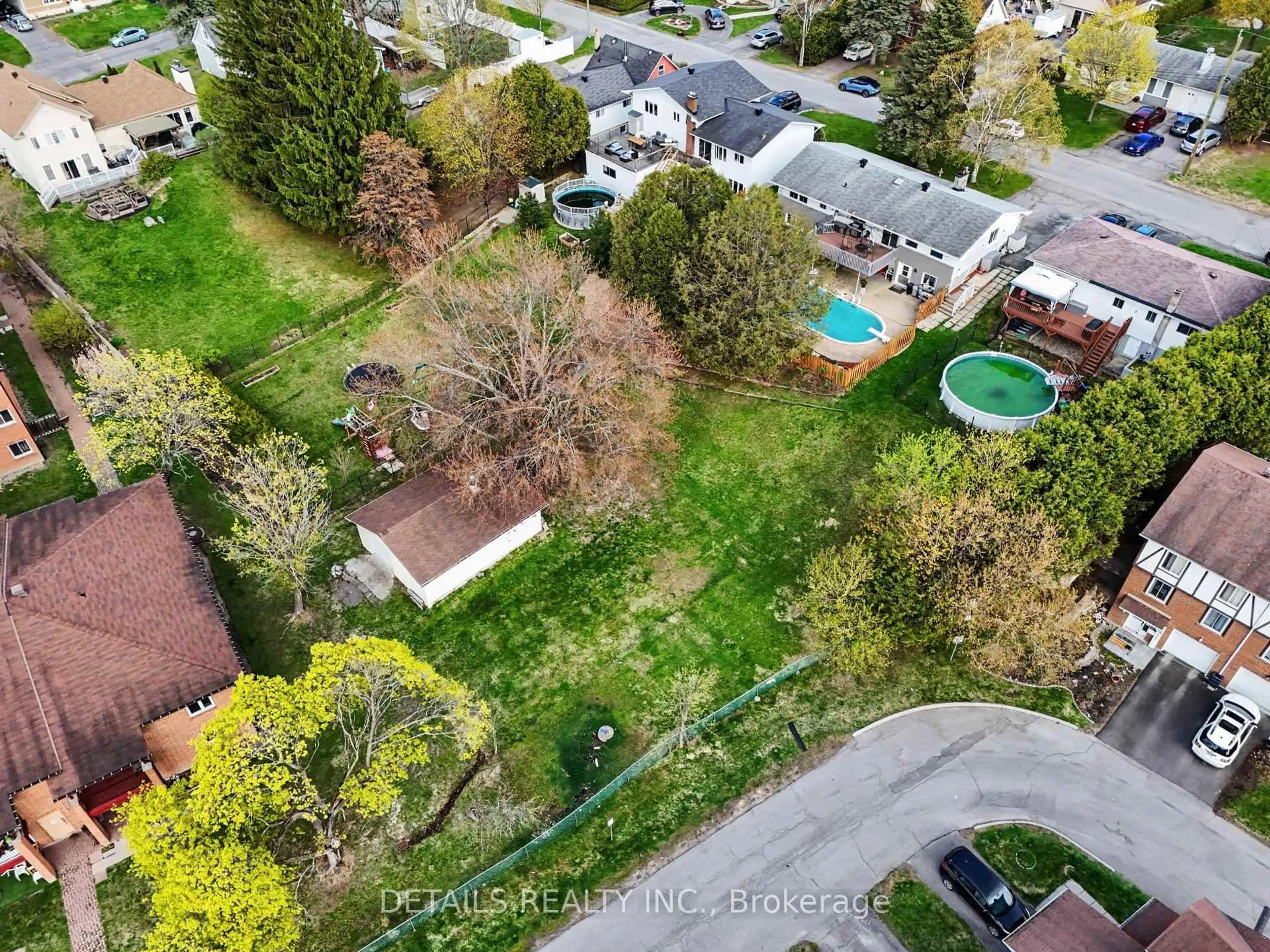 A pic from outside/outdoor area/front of a property/back of a property/a pic from drone, street for 1310 Cousineau St, Orleans Ontario K1C 1A7