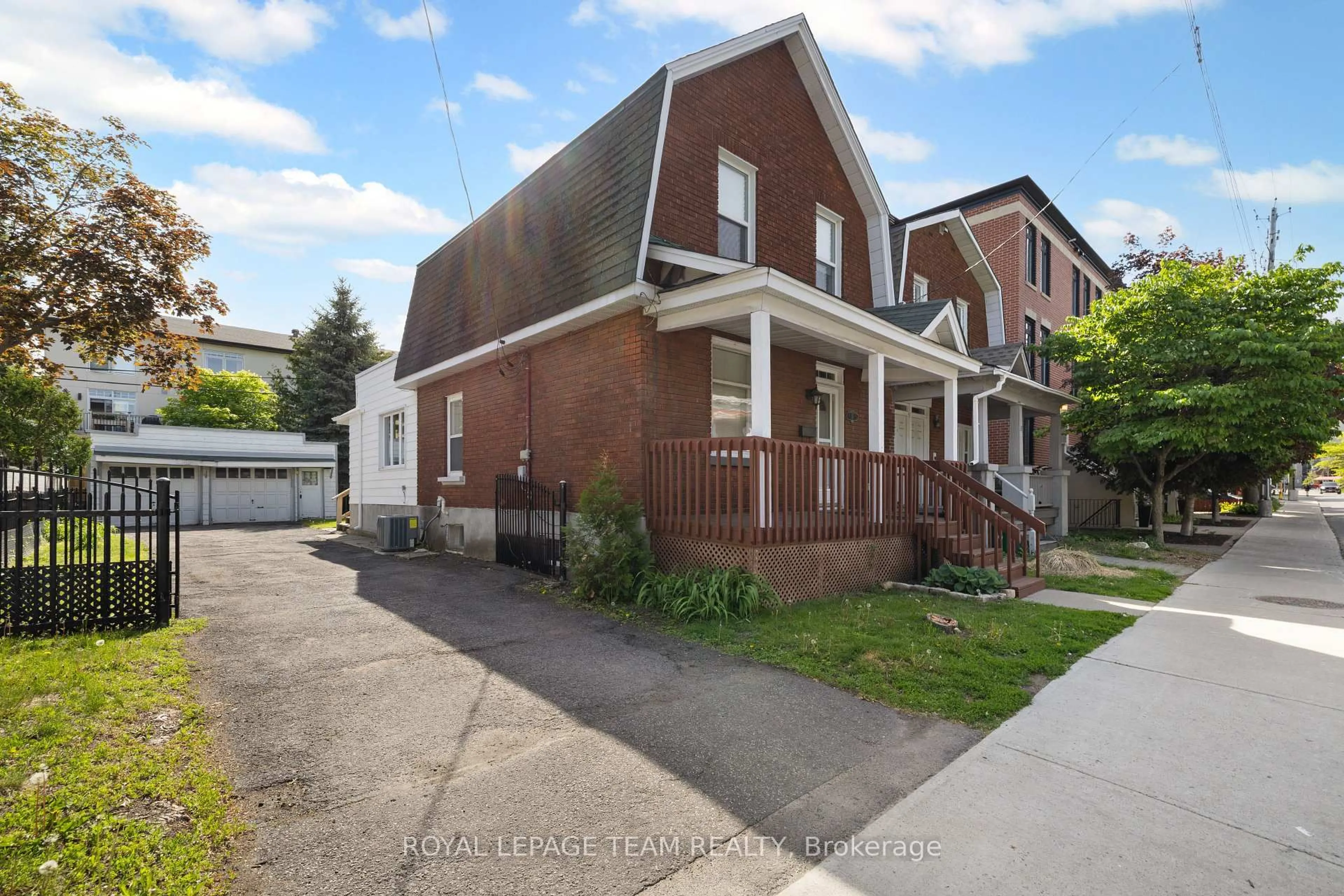 Home with brick exterior material, street for 35 Springfield Rd, Ottawa Ontario K1M 1C8