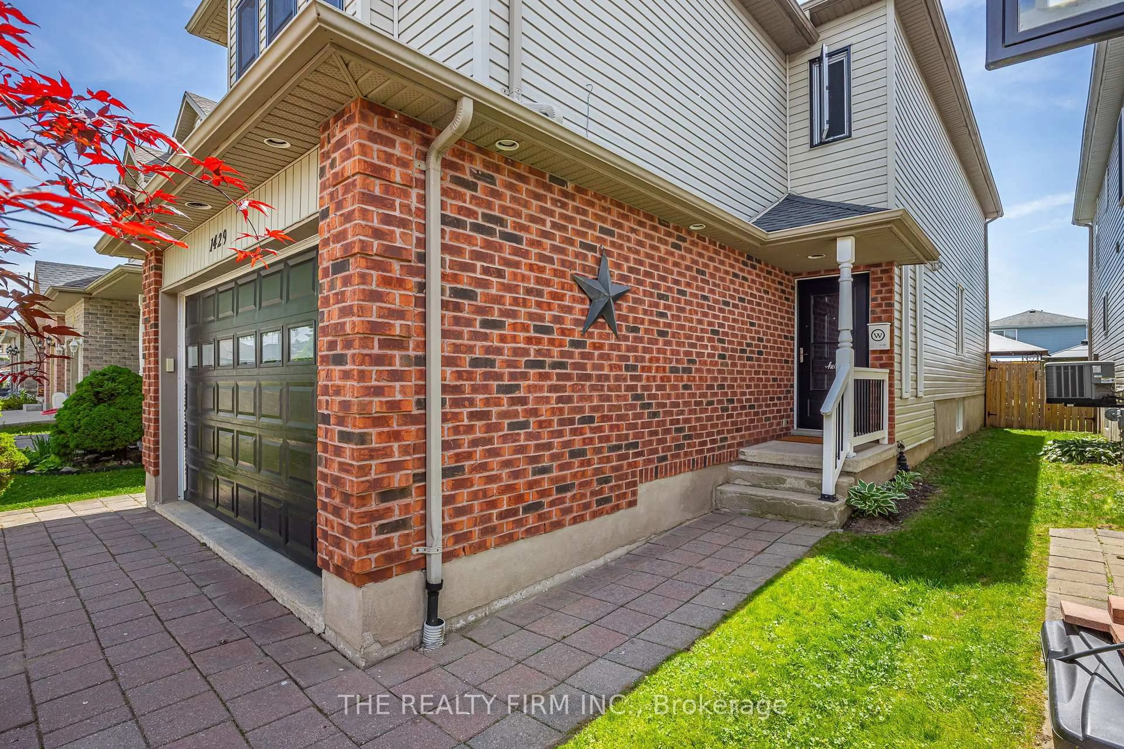 Home with brick exterior material, street for 1429 Aspenridge Cres, London East Ontario N5Y 5N2