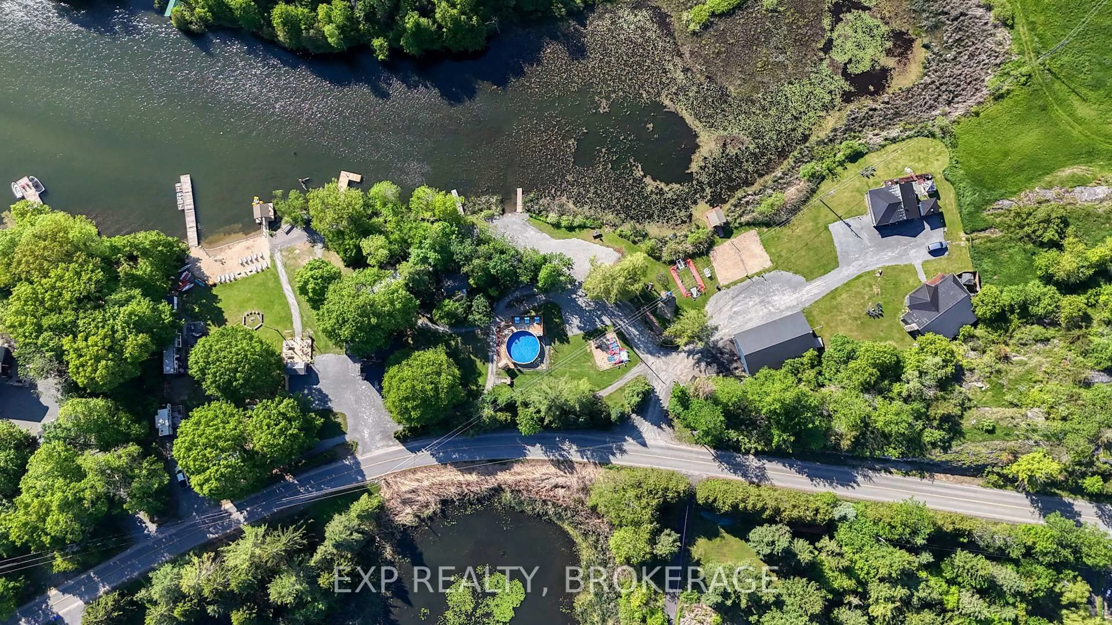 A pic from outside/outdoor area/front of a property/back of a property/a pic from drone, water/lake/river/ocean view for 4177 & 4187 CARRYING PLACE Rd, Seeley's Bay Ontario K0H 2N0