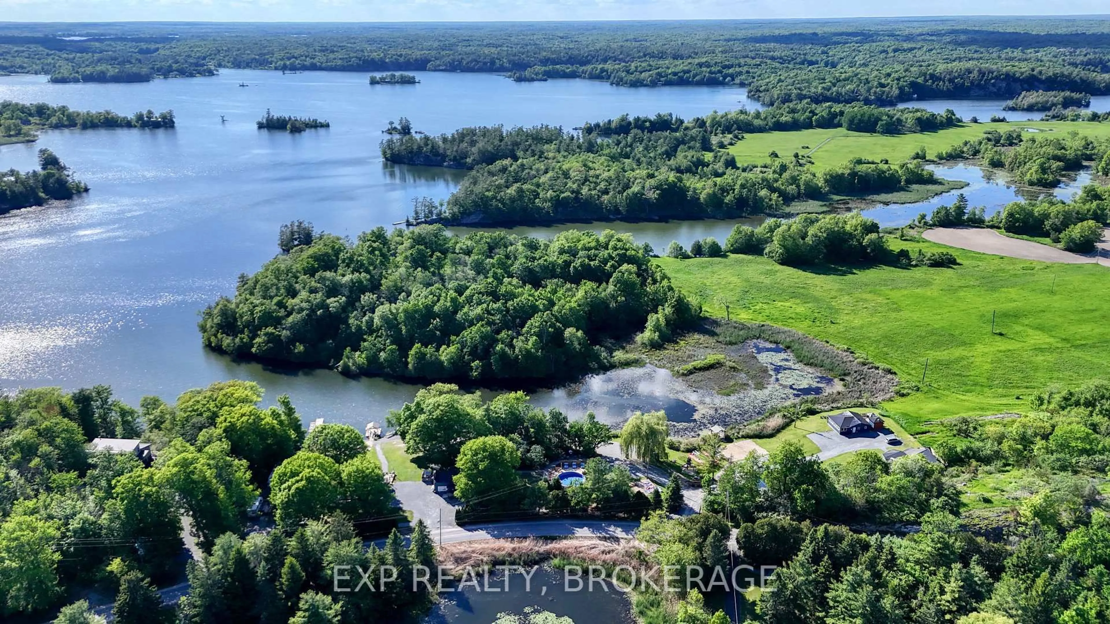 A pic from outside/outdoor area/front of a property/back of a property/a pic from drone, water/lake/river/ocean view for 4177 & 4187 CARRYING PLACE Rd, Seeley's Bay Ontario K0H 2N0