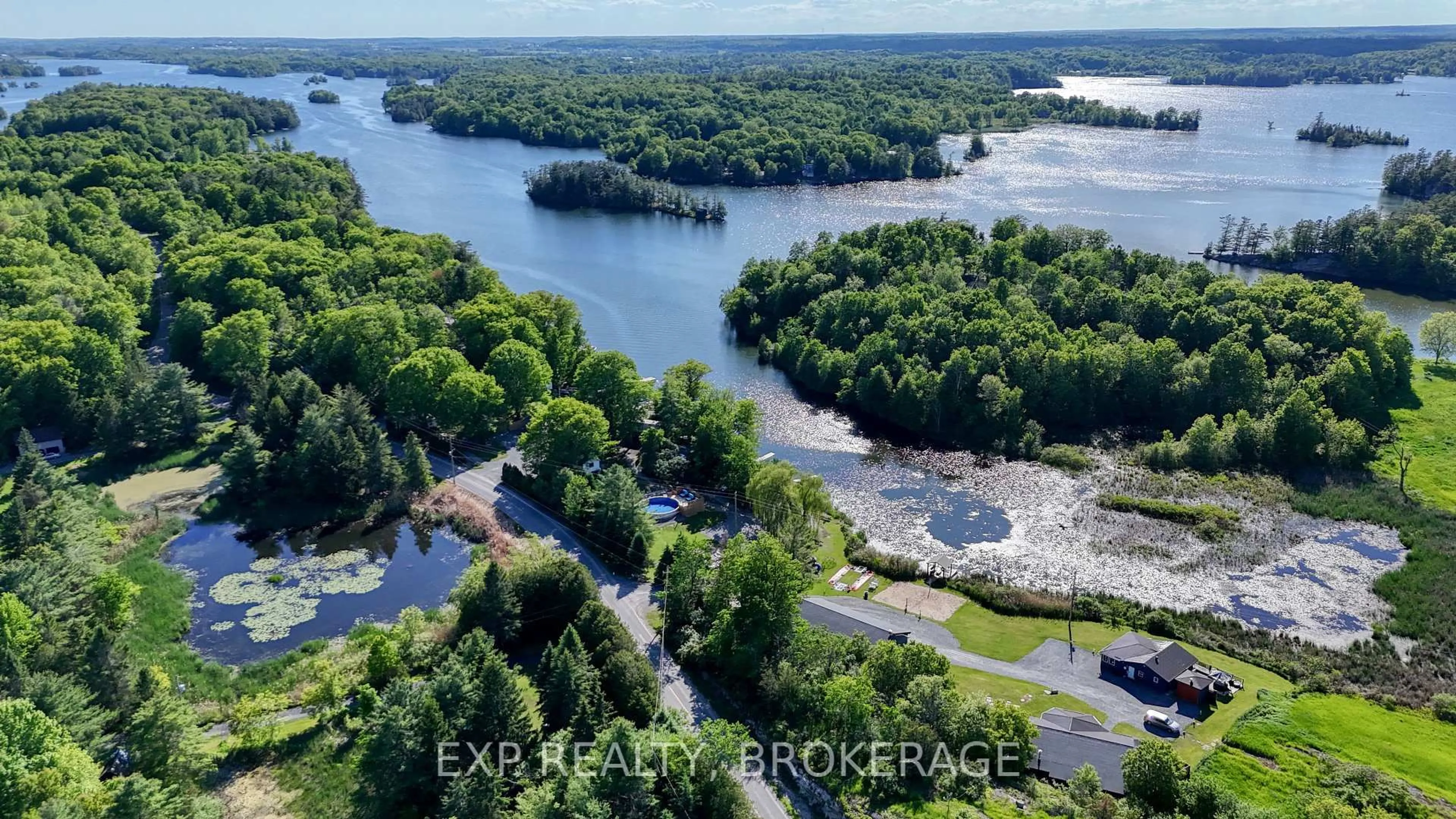 A pic from outside/outdoor area/front of a property/back of a property/a pic from drone, water/lake/river/ocean view for 4177 & 4187 CARRYING PLACE Rd, Seeley's Bay Ontario K0H 2N0
