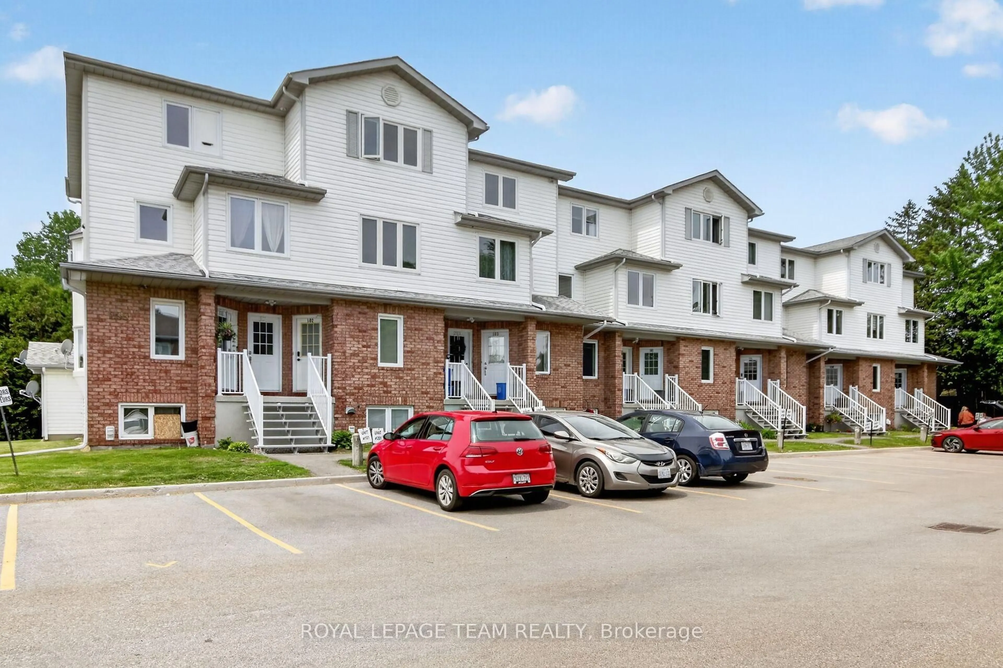 A pic from outside/outdoor area/front of a property/back of a property/a pic from drone, street for 299 Castor St #102, Russell Ontario K4R 1E9