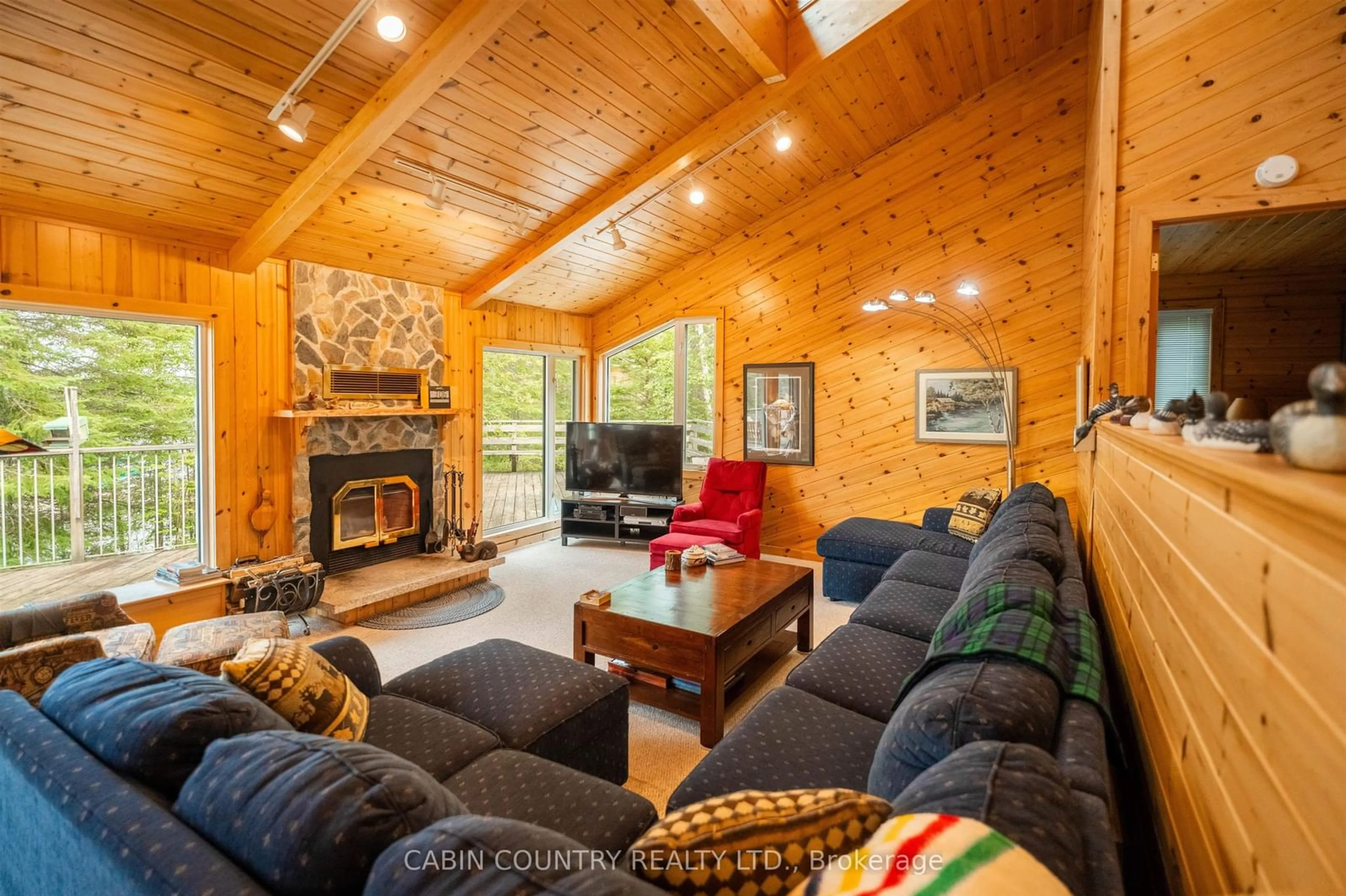Living room with furniture, wood/laminate floor for Lot 4 Lily Pad Bywy, Kenora Remote Area Ontario P0X 1C0