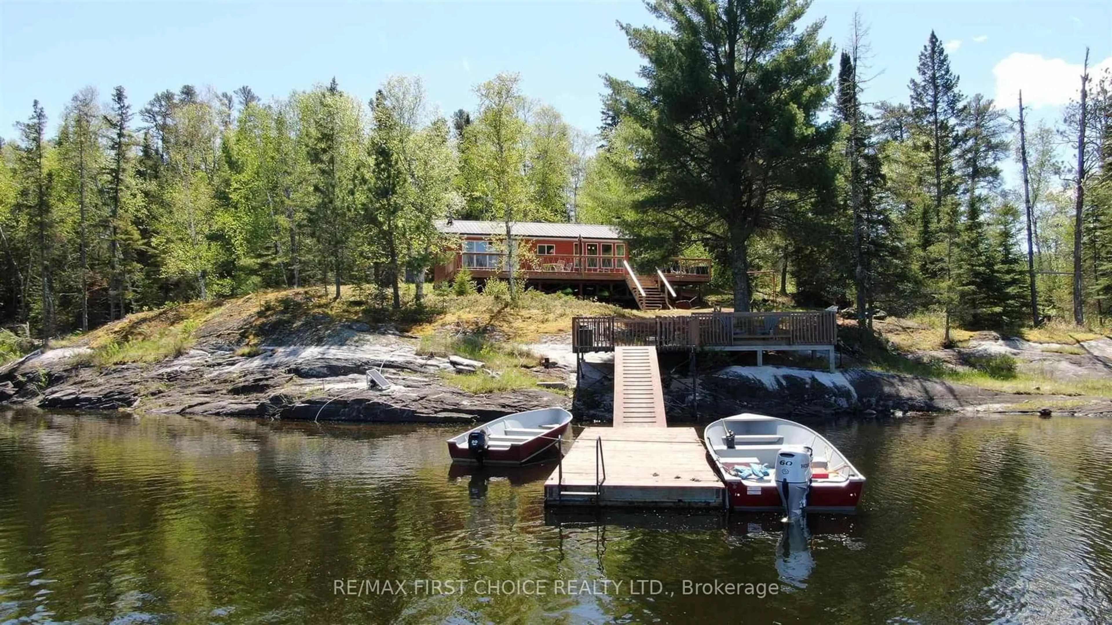 A pic from outside/outdoor area/front of a property/back of a property/a pic from drone, water/lake/river/ocean view for CL4111 Winnipeg River, Kenora Ontario P9N 0B9