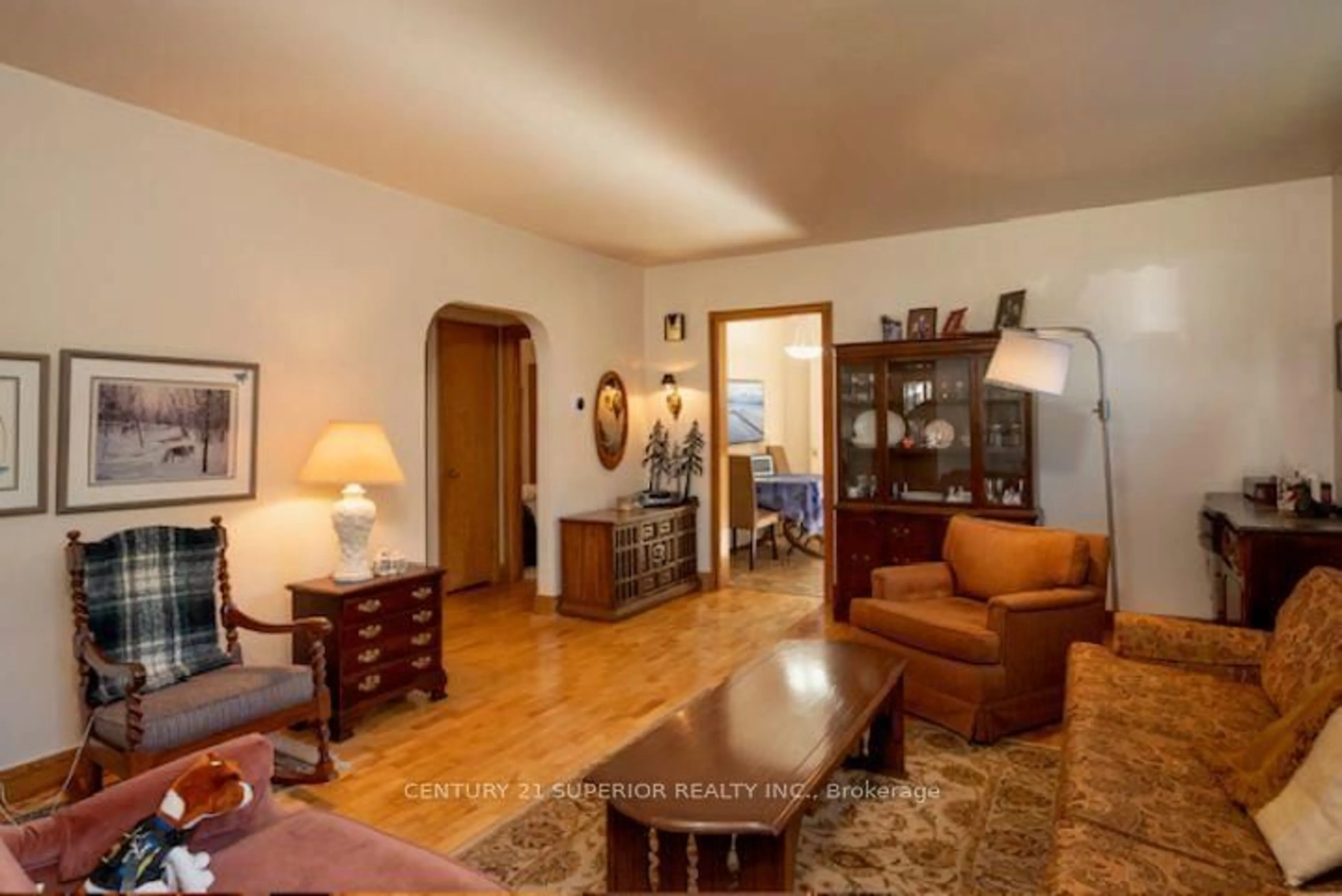 Living room with furniture, wood/laminate floor for 834 Syndicate Ave, Thunder Bay Ontario P7C 3X5