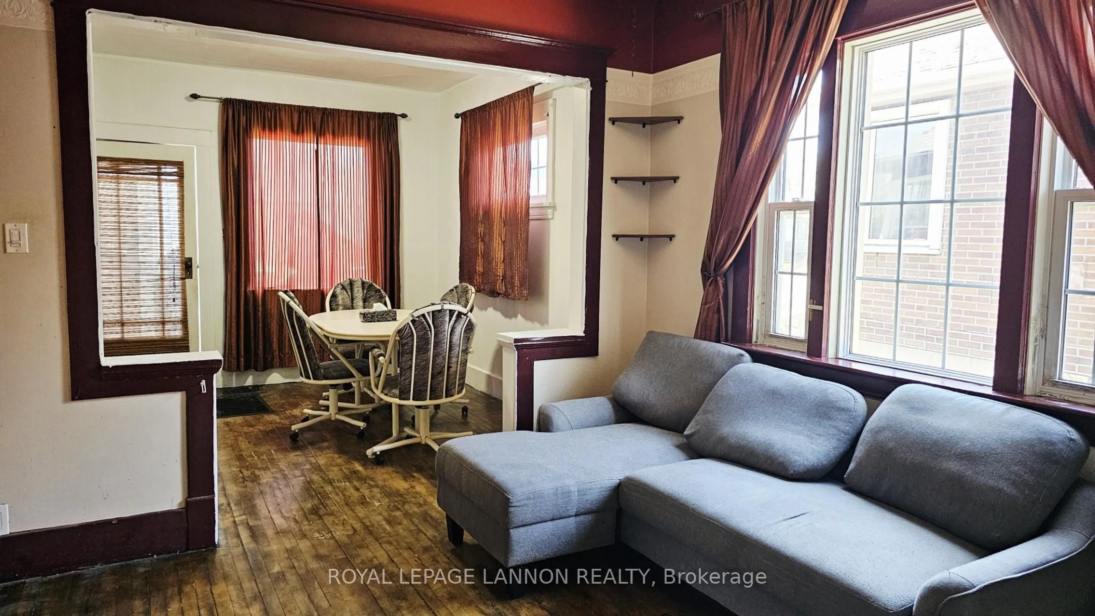 Living room with furniture, wood/laminate floor for 283 Brock St, Thunder Bay Ontario P7E 4H3