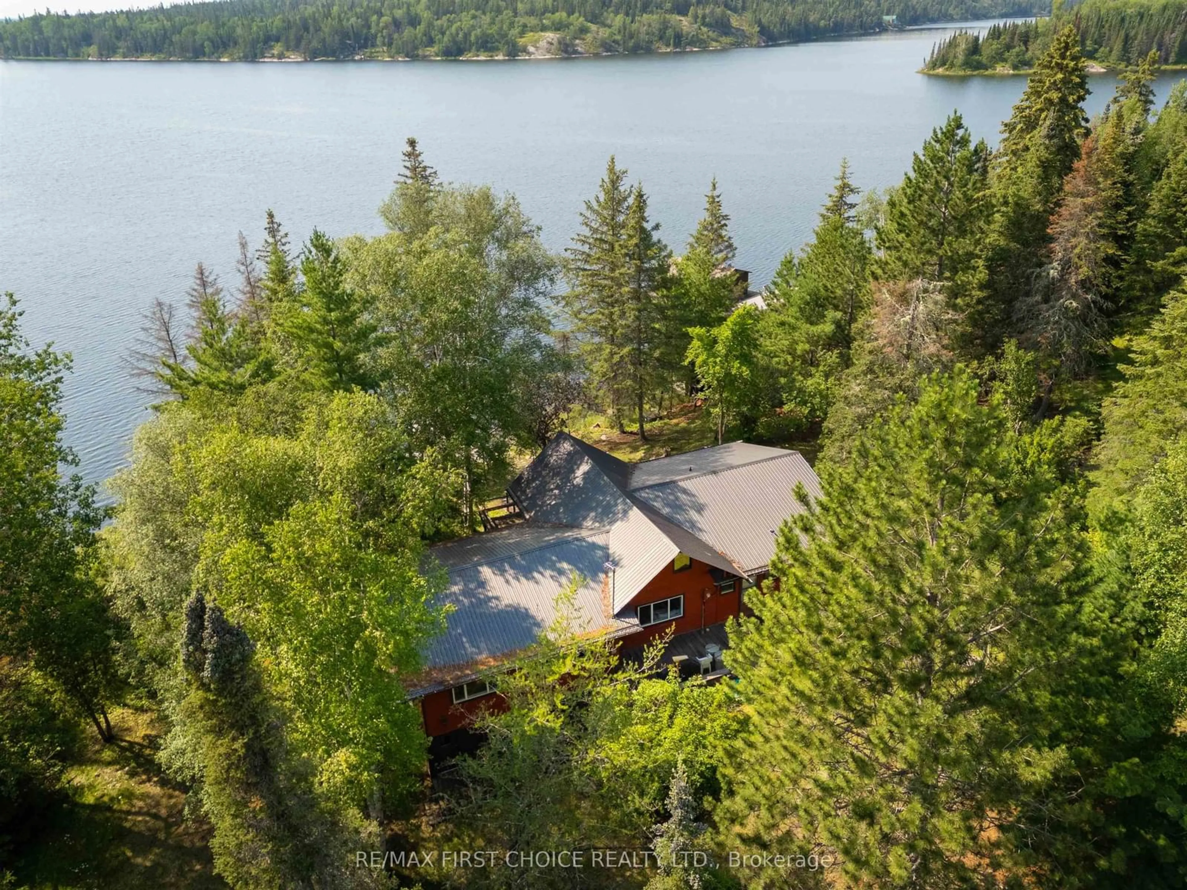 A pic from outside/outdoor area/front of a property/back of a property/a pic from drone, water/lake/river/ocean view for S986 Winnipeg River, Kenora Remote Area Ontario P0X 1J0
