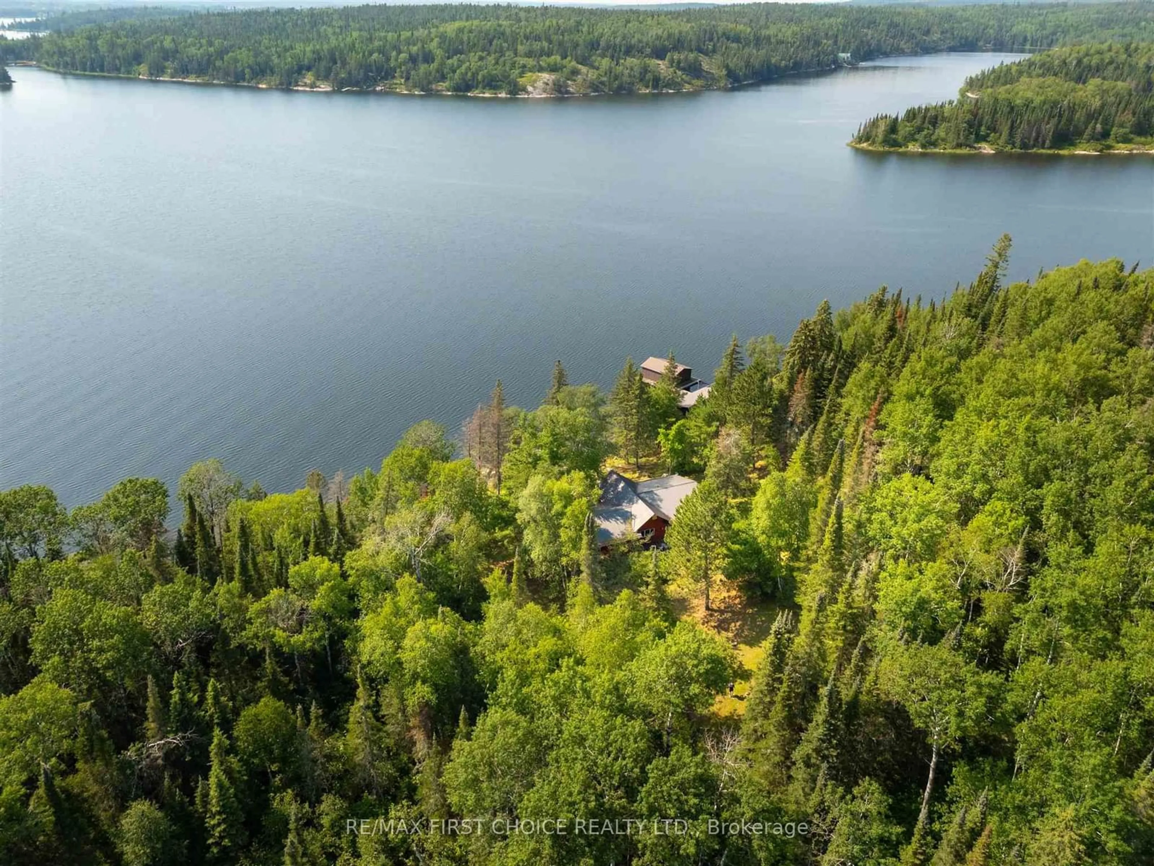 A pic from outside/outdoor area/front of a property/back of a property/a pic from drone, water/lake/river/ocean view for S986 Winnipeg River, Kenora Remote Area Ontario P0X 1J0