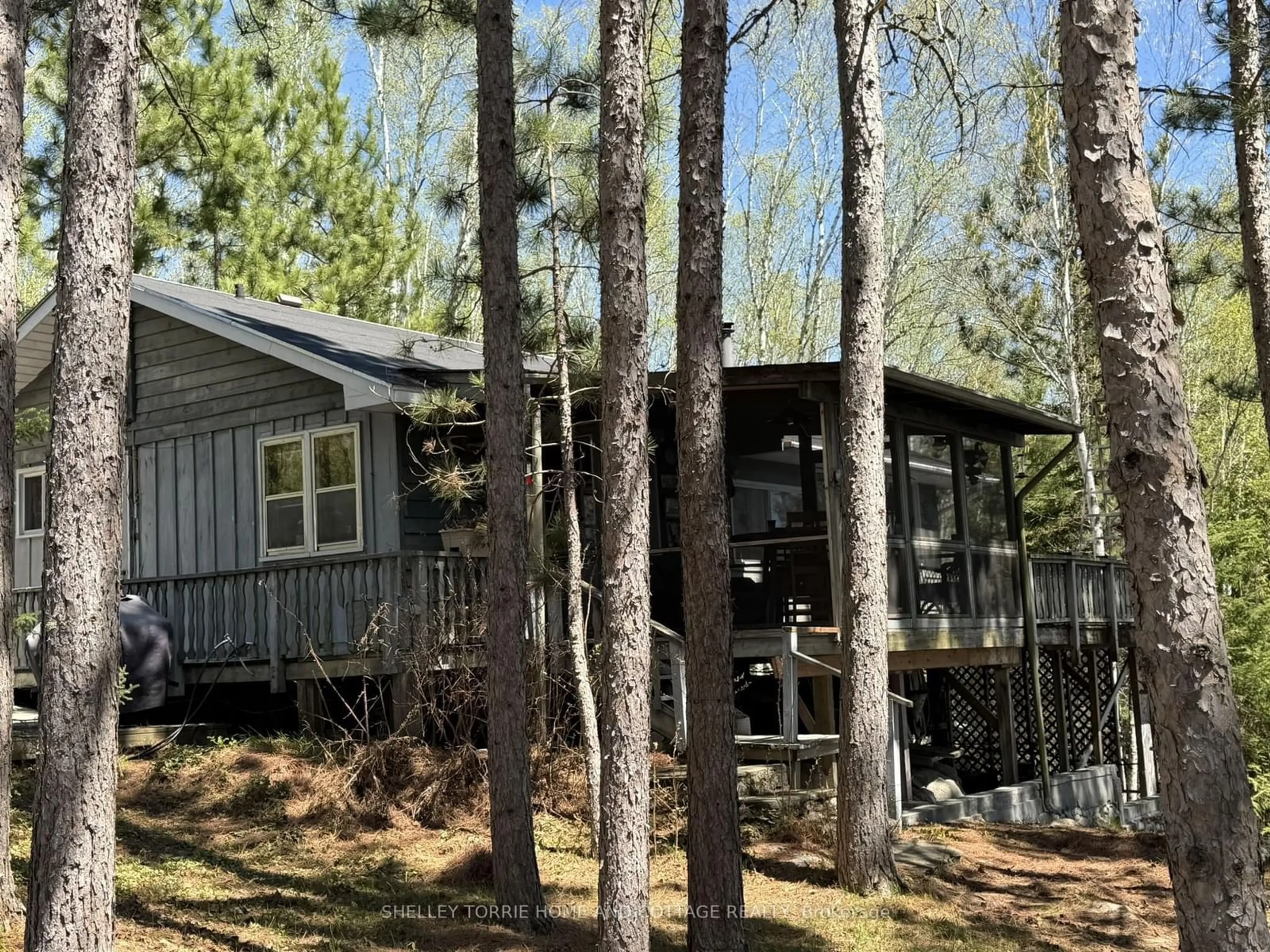 Home with vinyl exterior material, forest/trees view for 249 Gibi Lake Rd, Sioux Narrows-Nestor Falls Ontario P0X 1N0