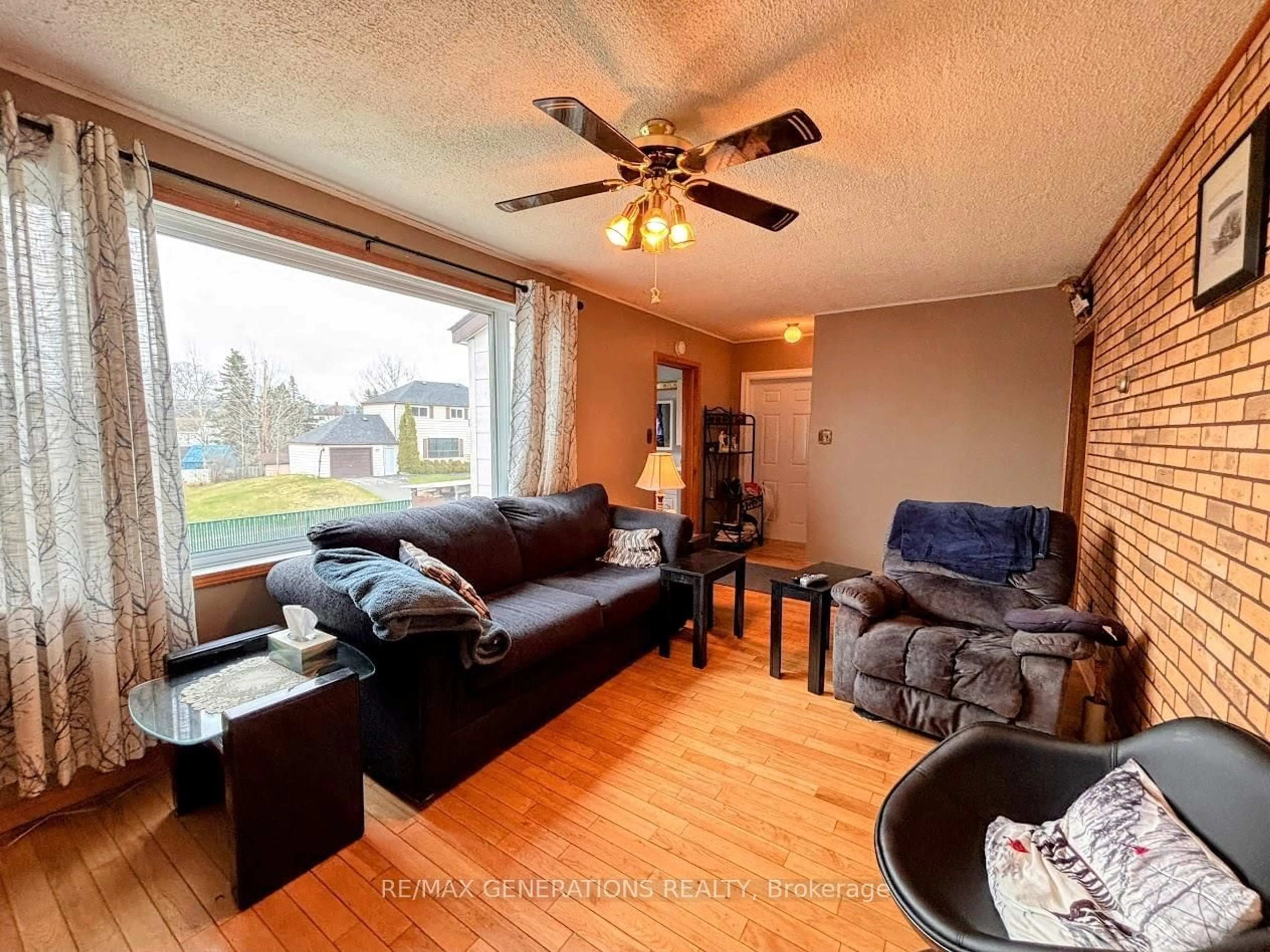 Living room with furniture, wood/laminate floor for 2 King St, Marathon Ontario P0T 2E0
