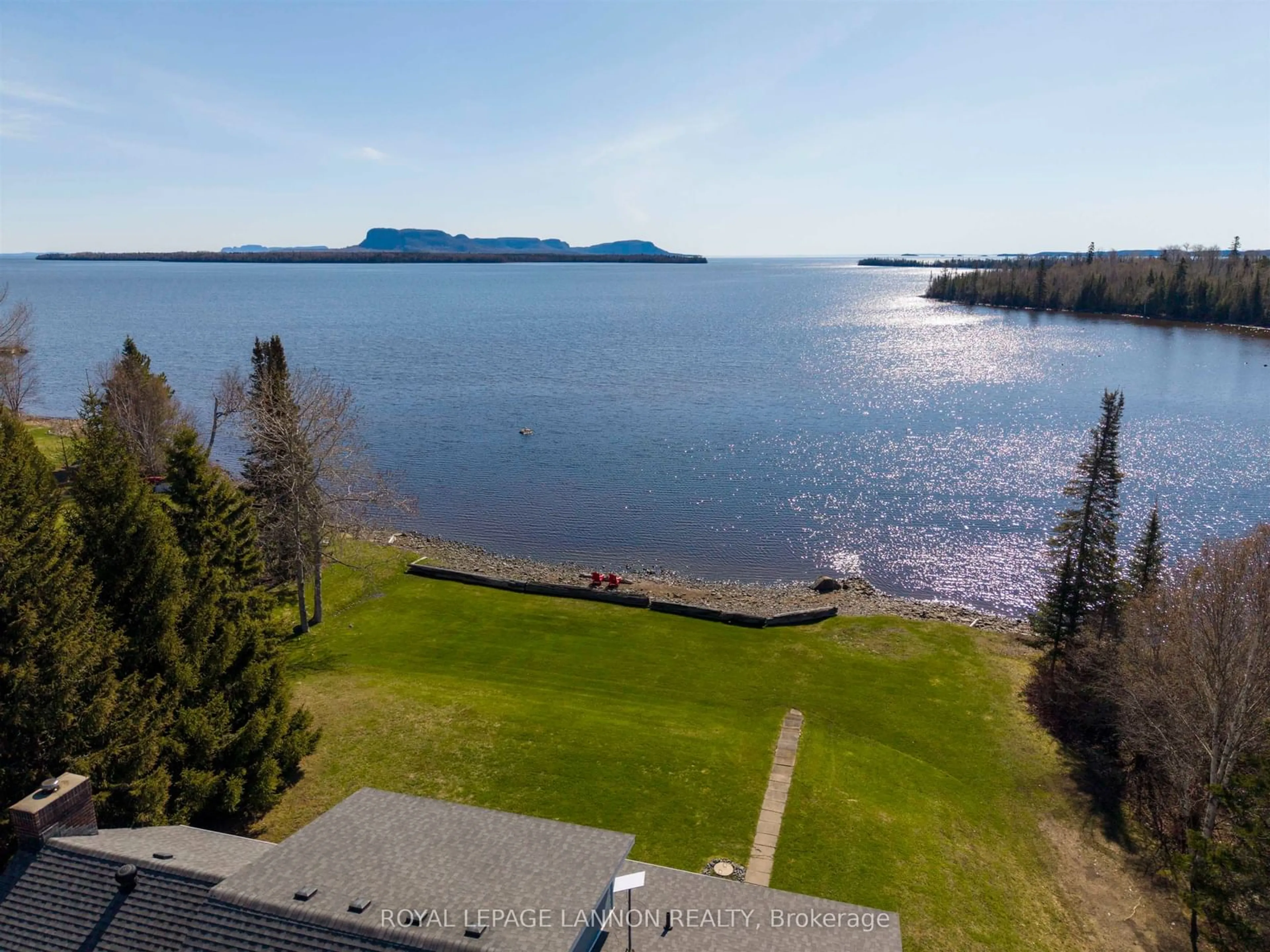 A pic from outside/outdoor area/front of a property/back of a property/a pic from drone, water/lake/river/ocean view for 26 Margaret St S, Neebing Ontario P7L 0C1