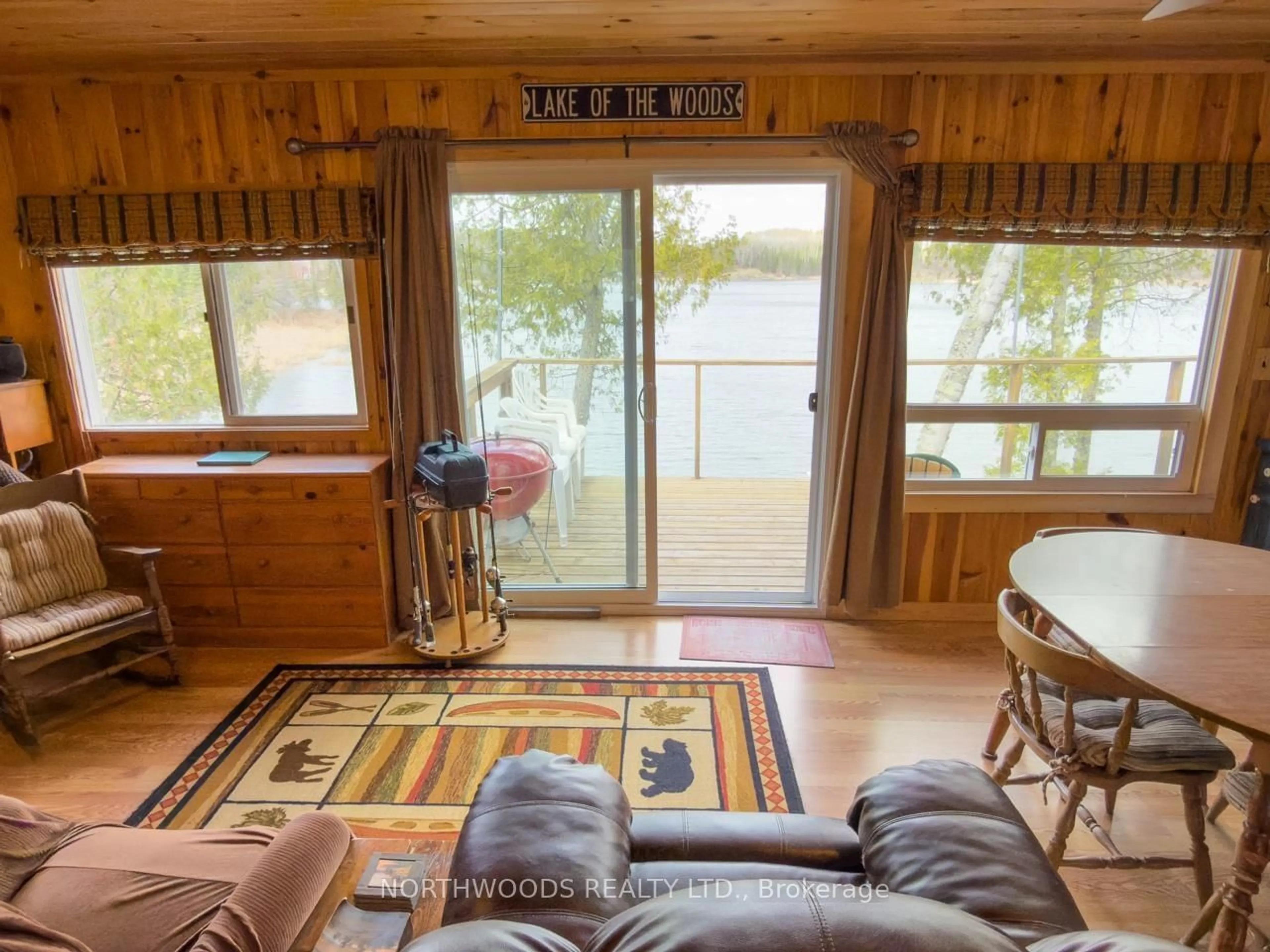 Living room with furniture, wood/laminate floor for 40 Bloomers Road, Sioux Narrows-Nestor Falls Ontario P0X 1N0