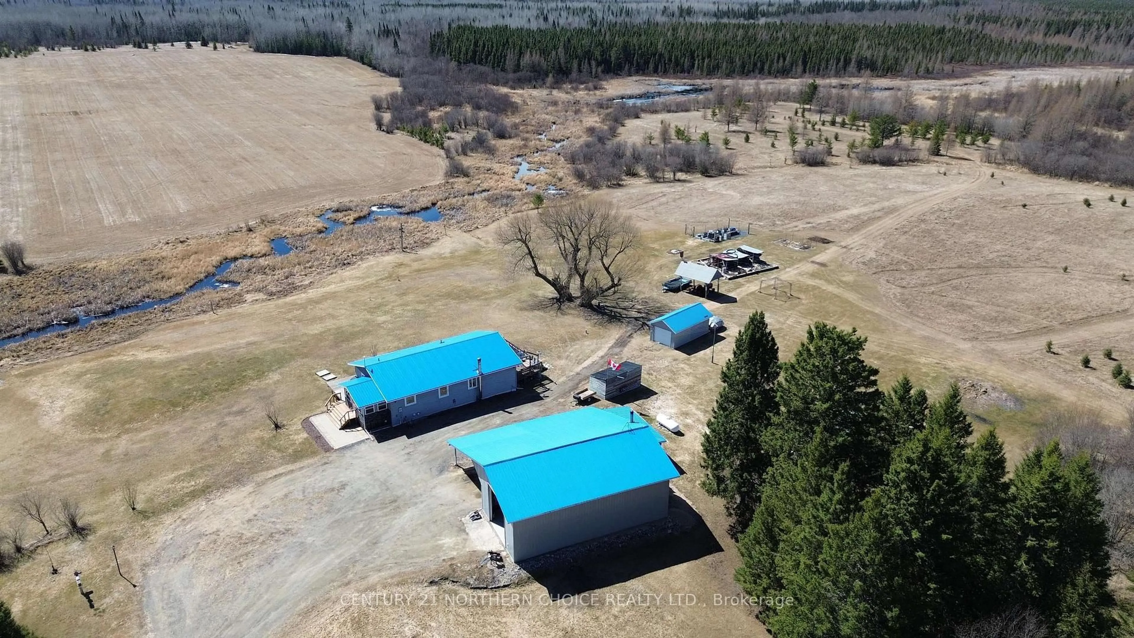 A pic from outside/outdoor area/front of a property/back of a property/a pic from drone, building for 1251 Barnhart Rd, Emo Ontario P0W 1E0