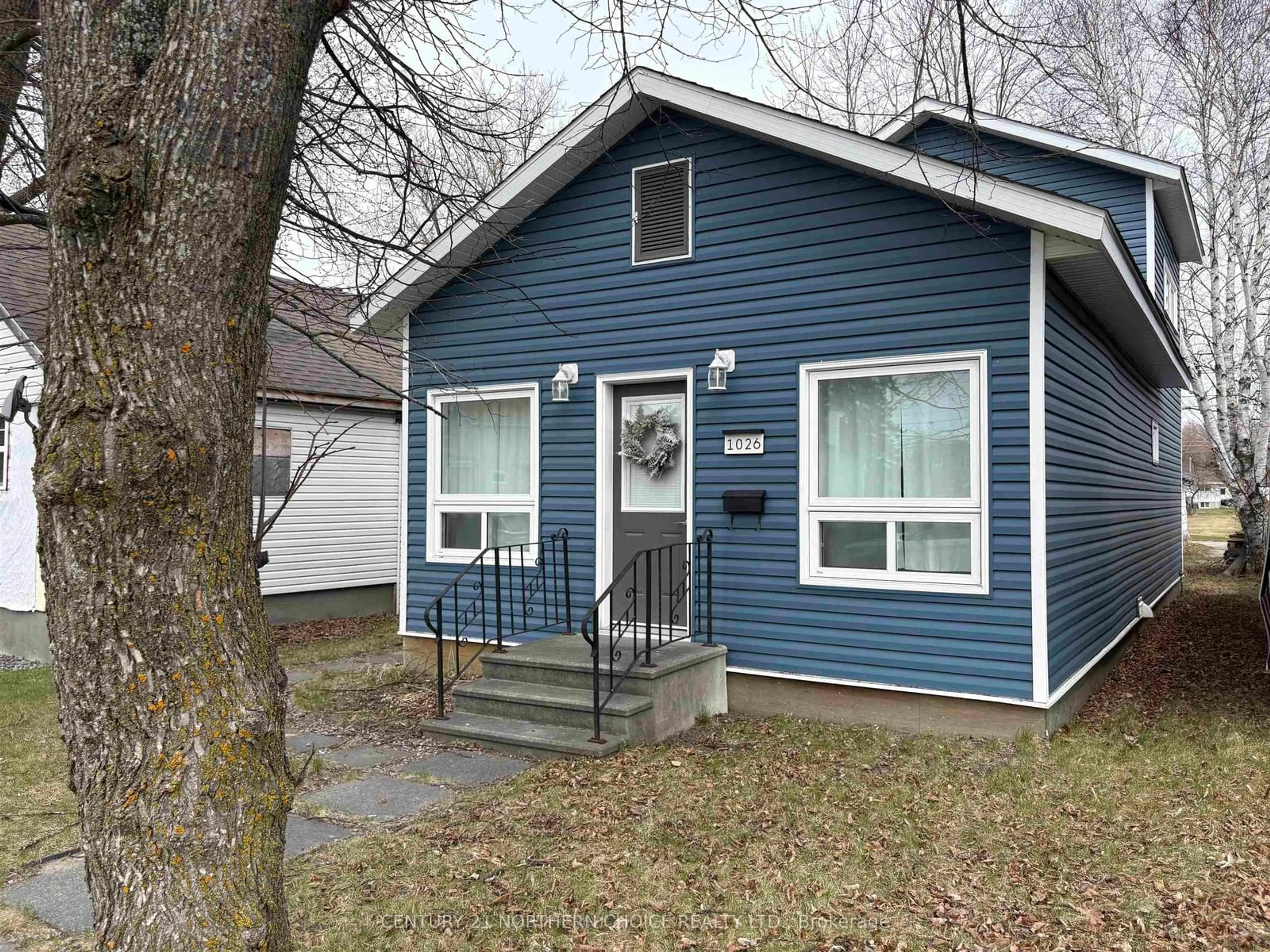 Home with vinyl exterior material, street for 1026 Third St, Fort Frances Ontario P9A 1S4