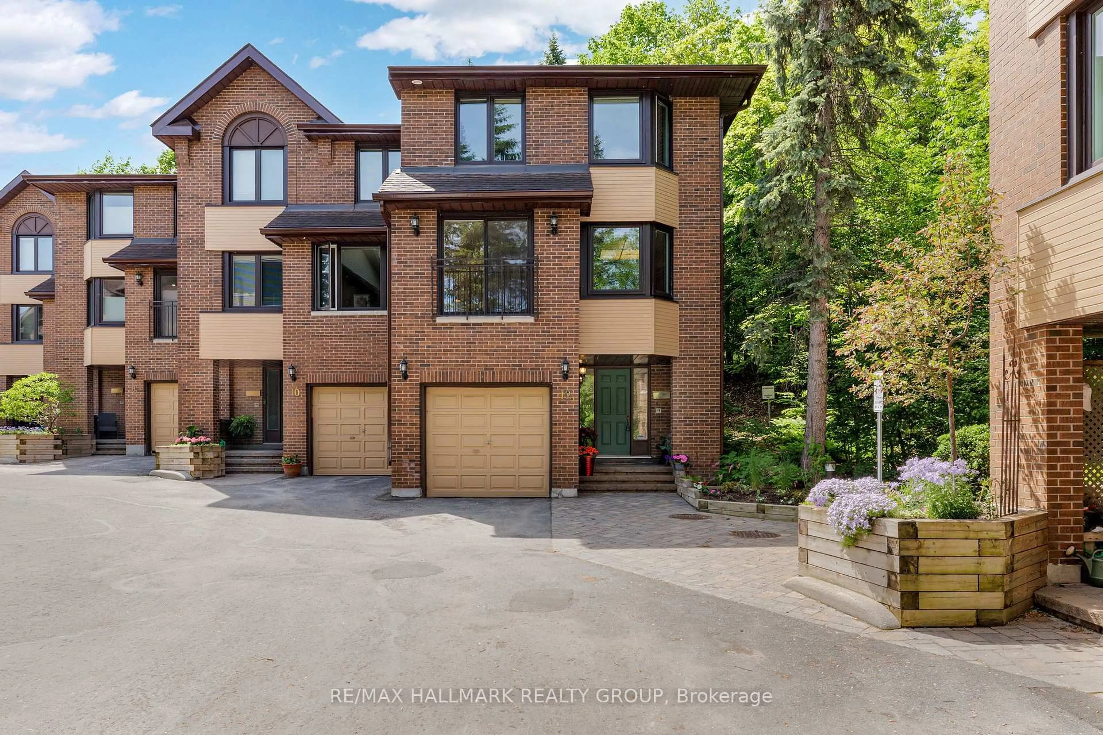 Home with brick exterior material, street for 12 Summershade Private #40, Ottawa Ontario K1Y 4R2