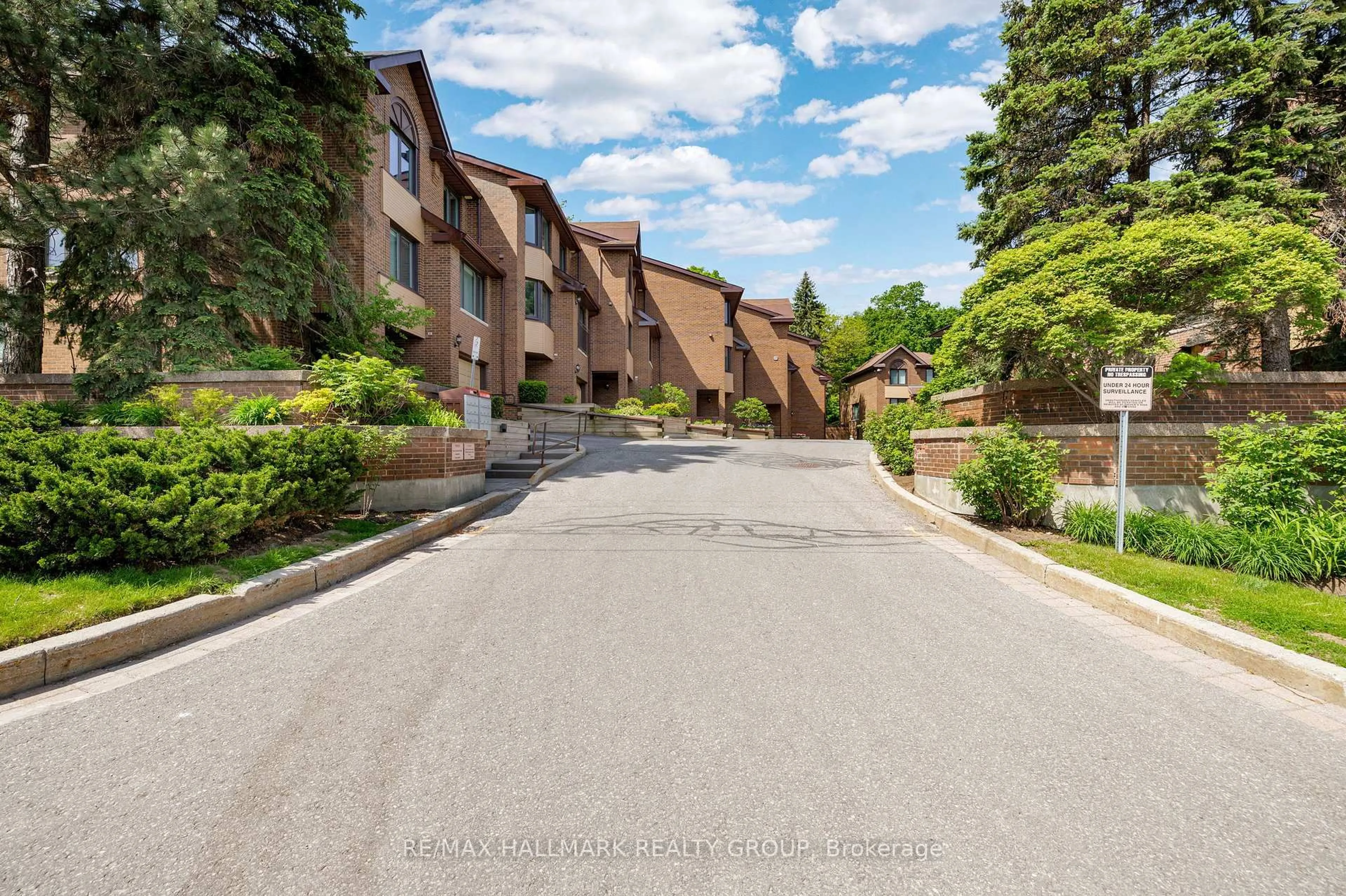 A pic from outside/outdoor area/front of a property/back of a property/a pic from drone, street for 12 Summershade Private #40, Ottawa Ontario K1Y 4R2