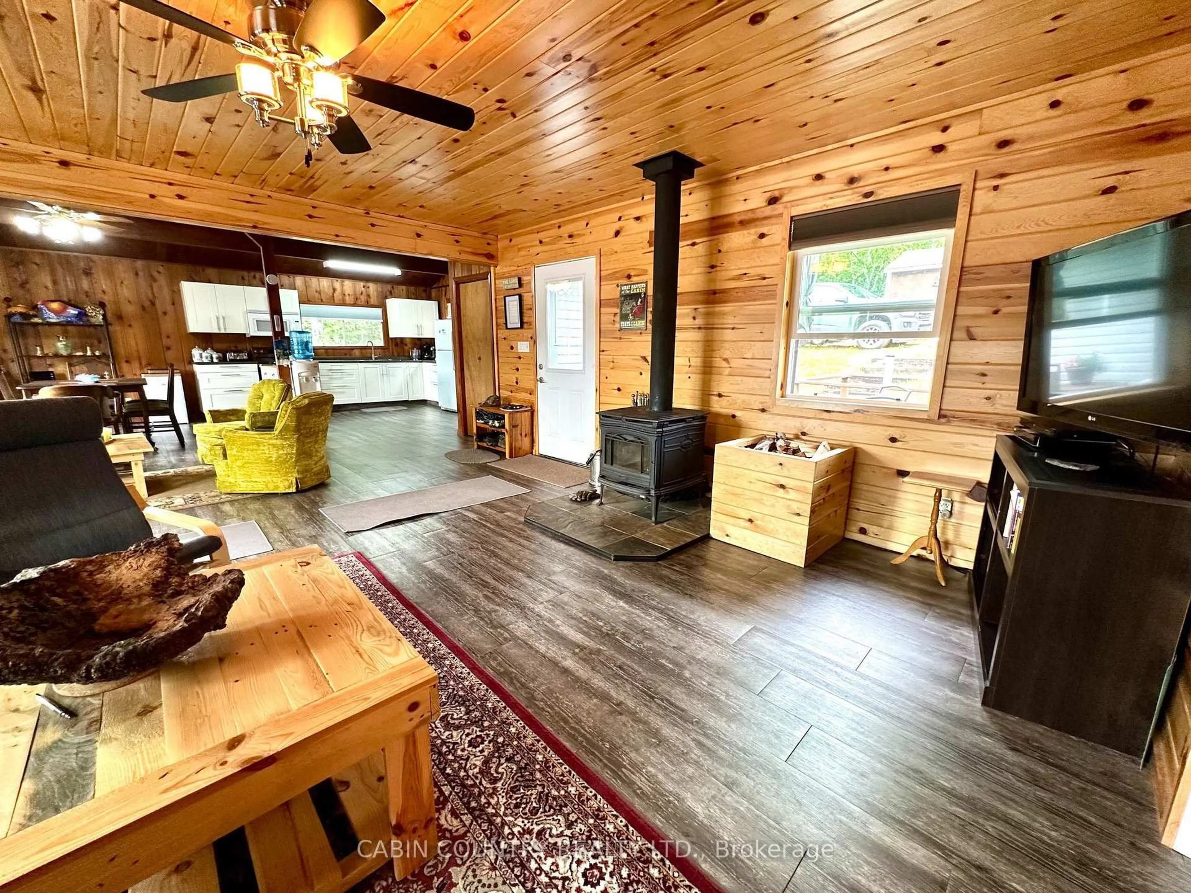 Open concept kitchen, wood/laminate floor for 1842-6B Sherwood Lake Road, Kenora Remote Area Ontario P0X 1H0